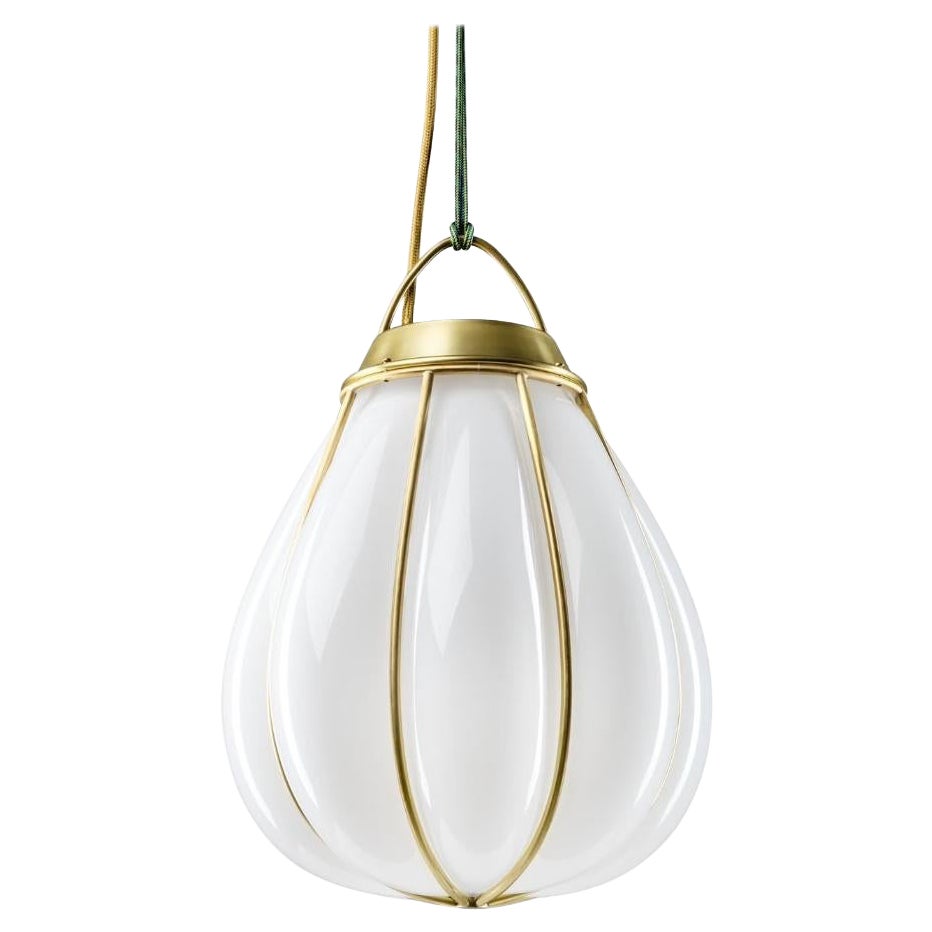 'Hobo' Glass and Brass Pendant by Örsjö

The Hobo pendant is inspired by Swedish ”luffarslöjd,” metalcrafts made by travelling workers many years ago in Småland, the home of the Swedish glass industry. Executed in a rough brass 