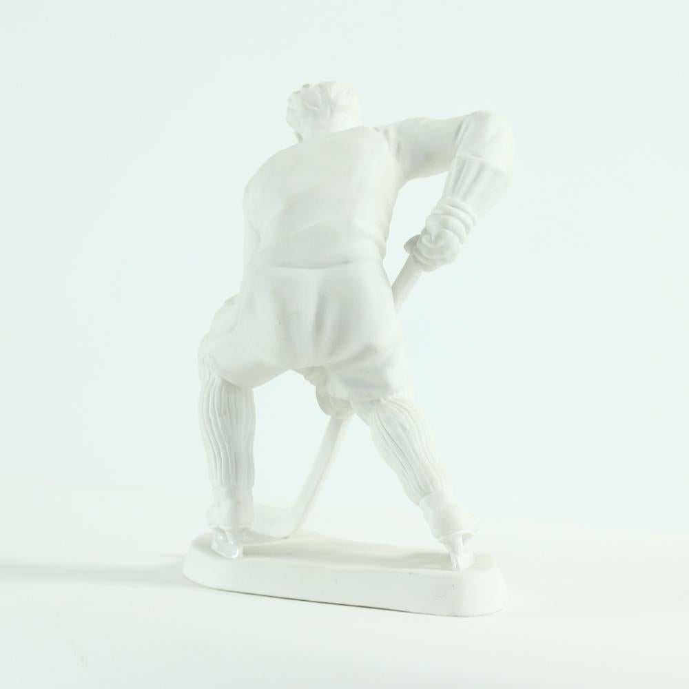 Rare porcelain statue of a hockey player. Produced by Royal Dux company in Czechoslovakia. The statue is marked as MS 1947, meaning World Championship 1947 edition. It is made in unglazed white porcelain, with only details glazed - for example the