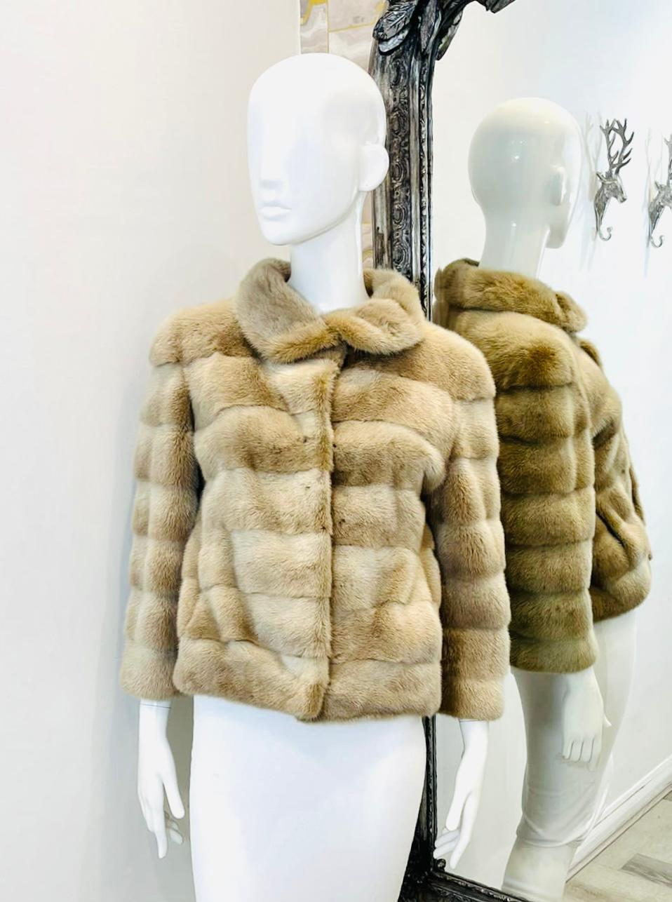 Hockley Mink Fur Jacket

Timeless blonde fur jacket detailed with glamorous panelled design.

Featuring spread collar, hook-and-eye fastening and two side pocket.

Size – M

Condition – Very Good

Composition – 100% Mink Fur
