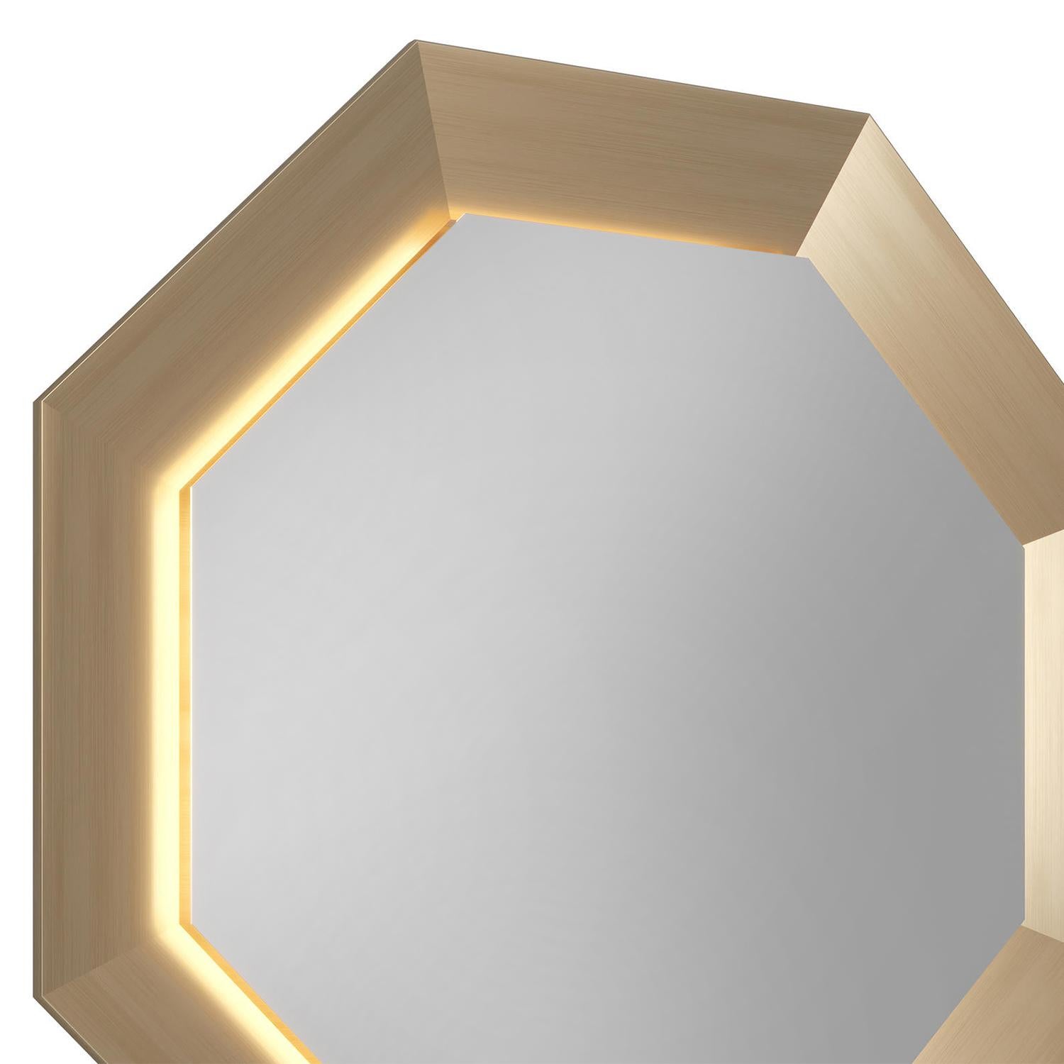 Mirror Hocto gold Matte with metal frame in gold brushed matte
finish and with hoctagonal mirror glass with led backlight system.