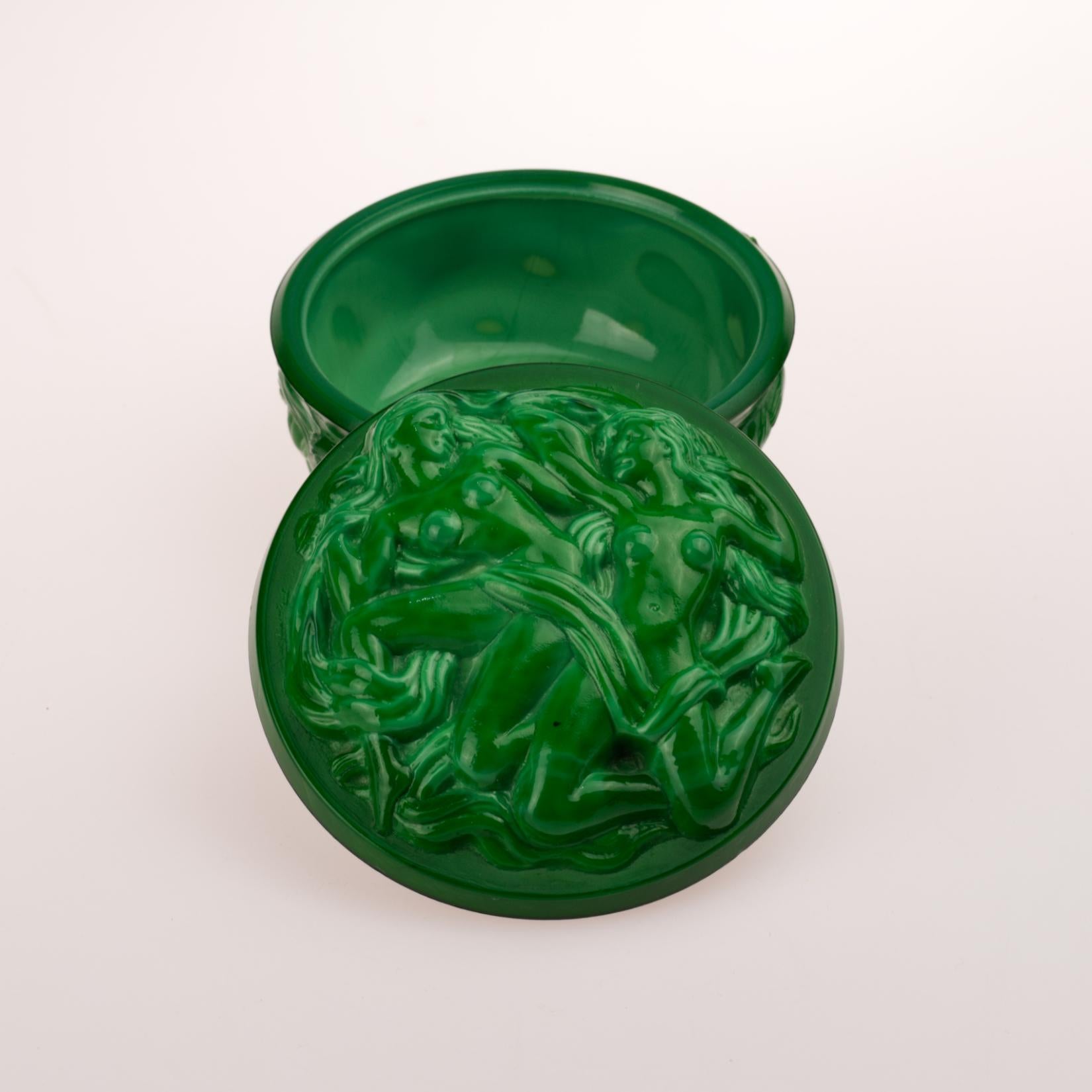 Fantastic example of a I. Heinrich Hoffmann Czech Art Deco malachite glass high relief reclining nude trinket box. It's done in beautiful green Czechoslovakian malachite glass with nudes on the sides and the cover this exquisite jewelry box is a