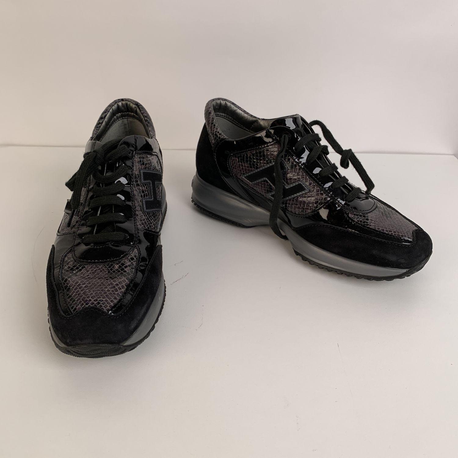 Glamourous Hogan 'Interactive' sneakers shoes crafted in black suede and patent leather. Hogan logo on snake-look panel. Removable internal footbed. Made in Italy. Size: 37. Hogan box and dustbag included. Extra-laces included.



Details

MATERIAL: