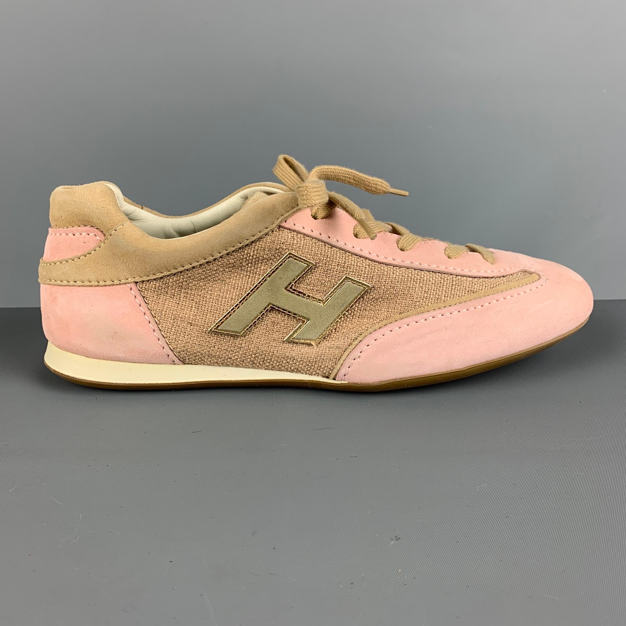 HOGAN OLYMPIA sneakers comes in a beige and pink suede featuring a low top style, rubber sole and a lace up closure.

Very Good Pre-Owned Condition. Moderate wear.
Marked: 8

Outsole: 10.5 in. x 3.25 in.  

SKU: 117839
Category: Sneakers

More