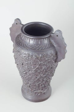 Höganäs. Ceramic vase with textured surface and sculptural handles. Early 20th C
