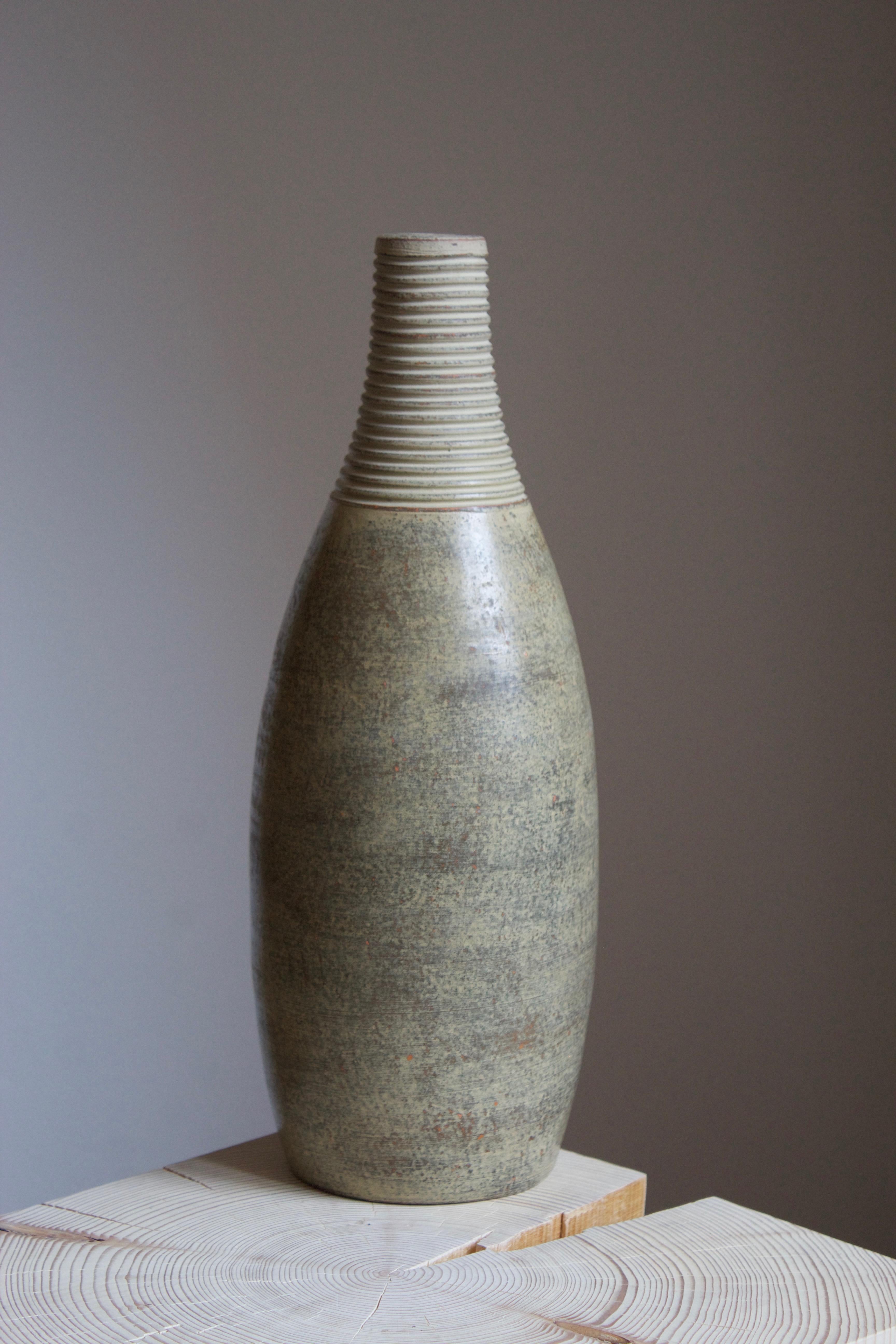 A vase, production attributed to Höganäs Keramik. Stamp unidentified, likely model number. Sourced in collection of ceramics by Höganäs.
 
