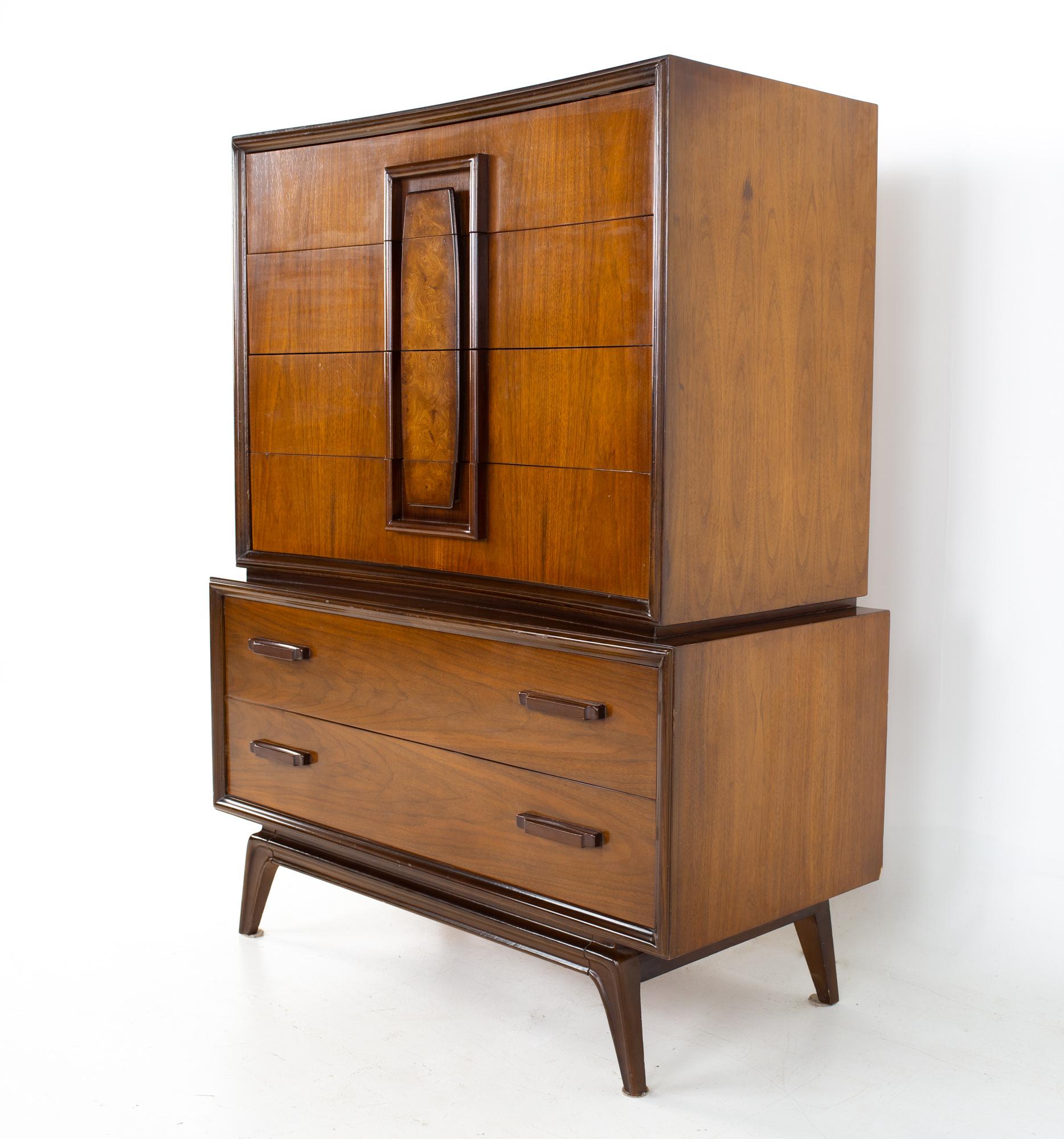 Hoke Wood Products mid century walnut and burlwood gentleman's chest highboy dresser
Dresser measures: 39.75 wide x 21.25 deep x 56.75 inches high

All pieces of furniture can be had in what we call restored vintage condition. That means the