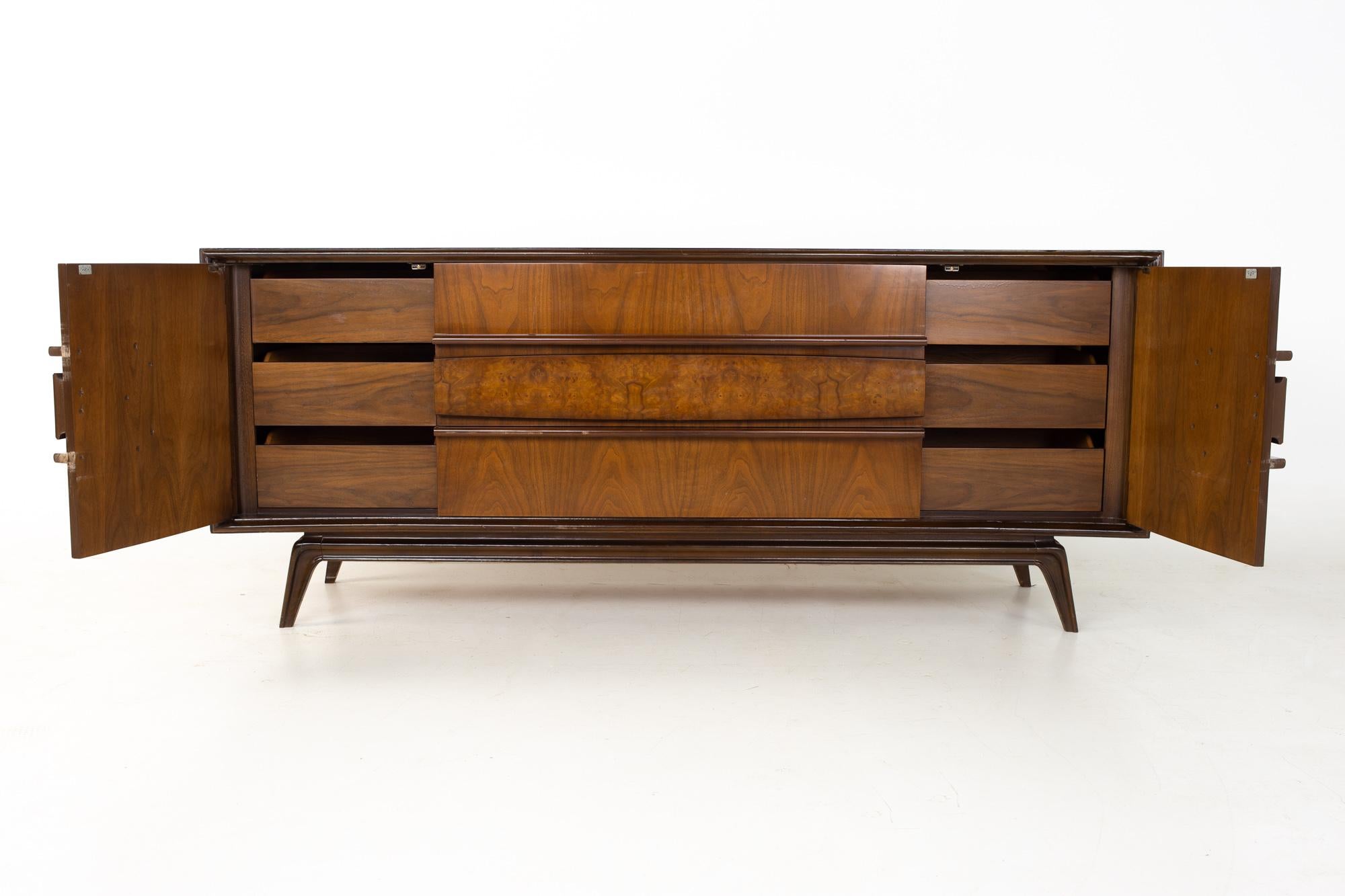 Hoke Wood Products mid century walnut and burlwood 9 drawer lowboy dresser

Dresser measures: 80 wide x 21 deep x 33.5 inches high

All pieces of furniture can be had in what we call restored vintage condition. That means the piece is restored