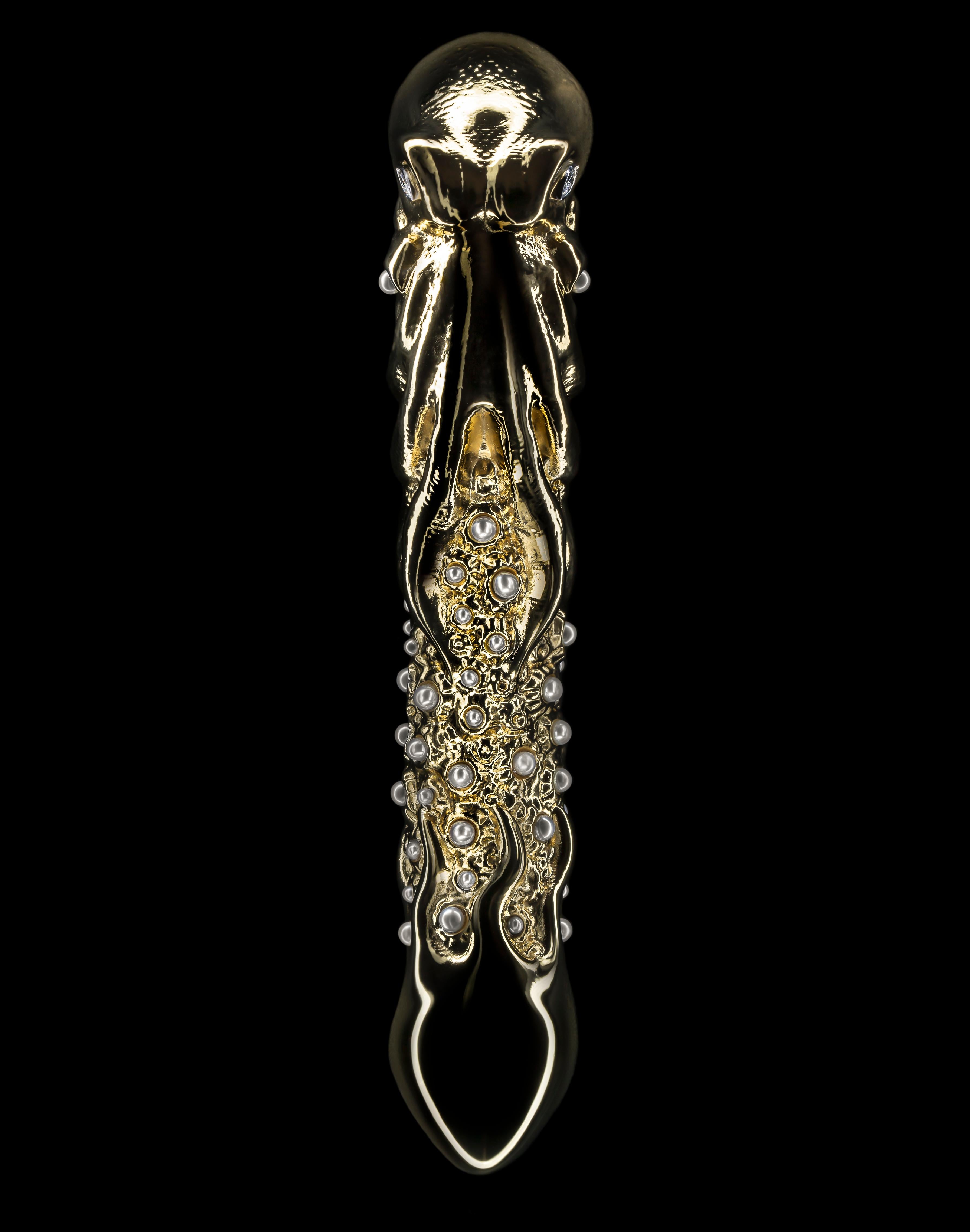 The Hokusai Dreaming Olisbos Sculpture, is electroformed from pure 24K gold and set with flawless marquise diamonds and natural sea pearls incorporated into a coral styled shaft. This unique erotic art piece was inspired by famous Japanese artist
