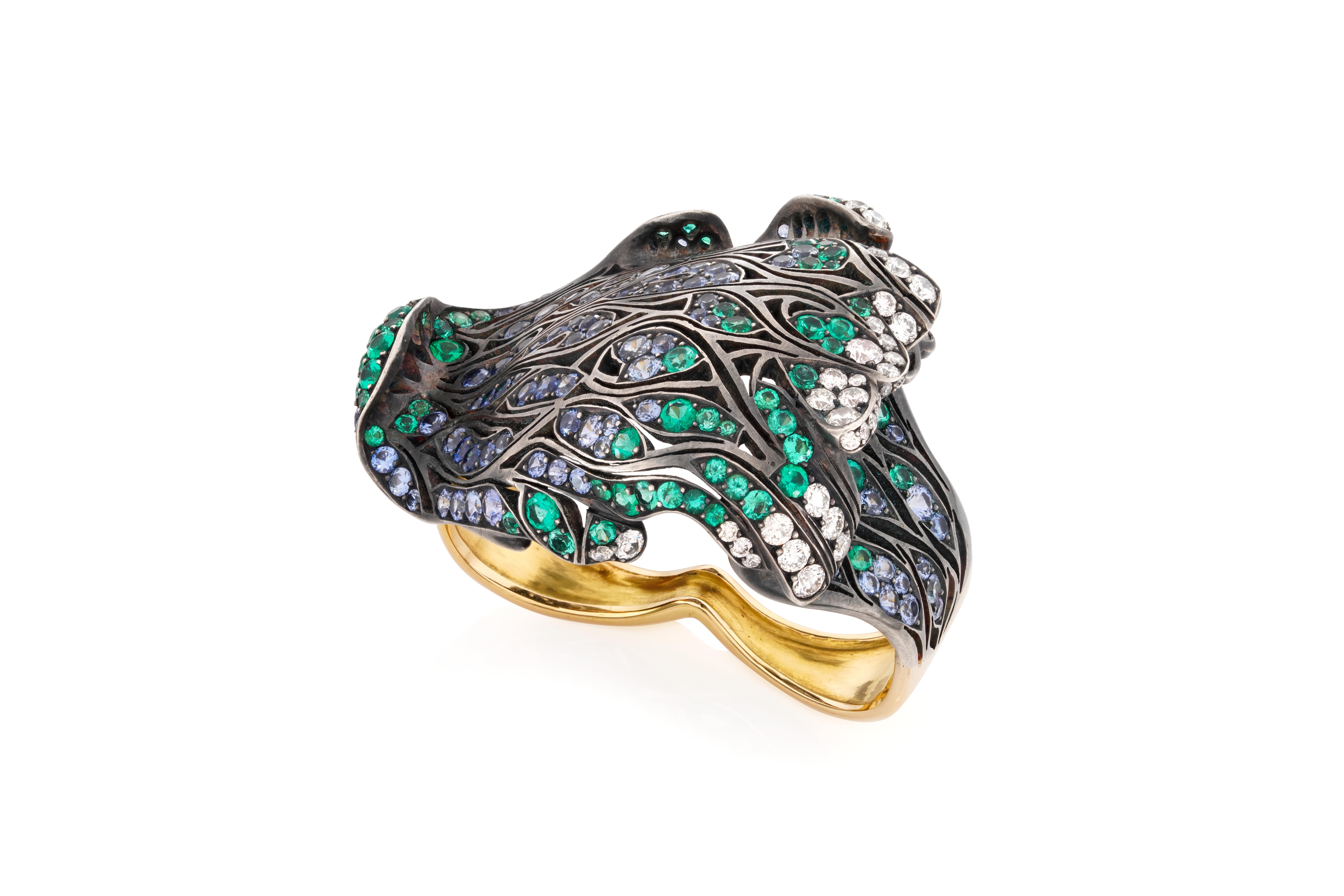 One of a kind piece of art. 
This two fingers ring is a tribute to Hokusai’s Great wave of Kanagawa. It is a sculpture, with a great unusual volume. It is enhanced by the high jewelry work of fret-sawing, creating a metal lace, and ajour. The lines