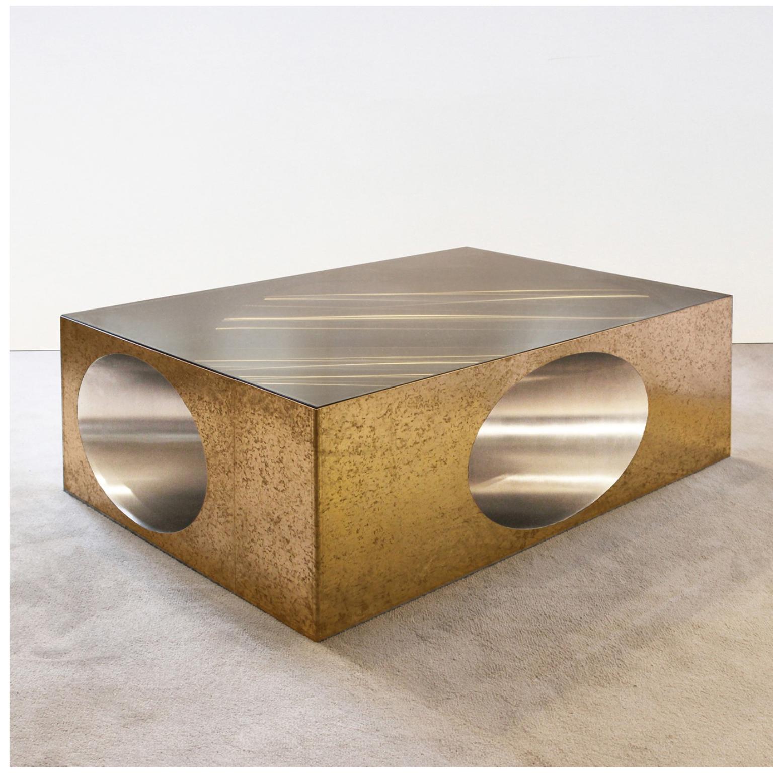 Hol-low table by Christian Zahr
Dimensions: W 120 x D 80 x H 40 cm
Materials: Brass- Brass tin lined inside- Tainted glass

Each Piece is Handmade.

Christian Zahr studied architecture at the Academie Libanaise des Beaux Arts, Beirut, Lebanon.