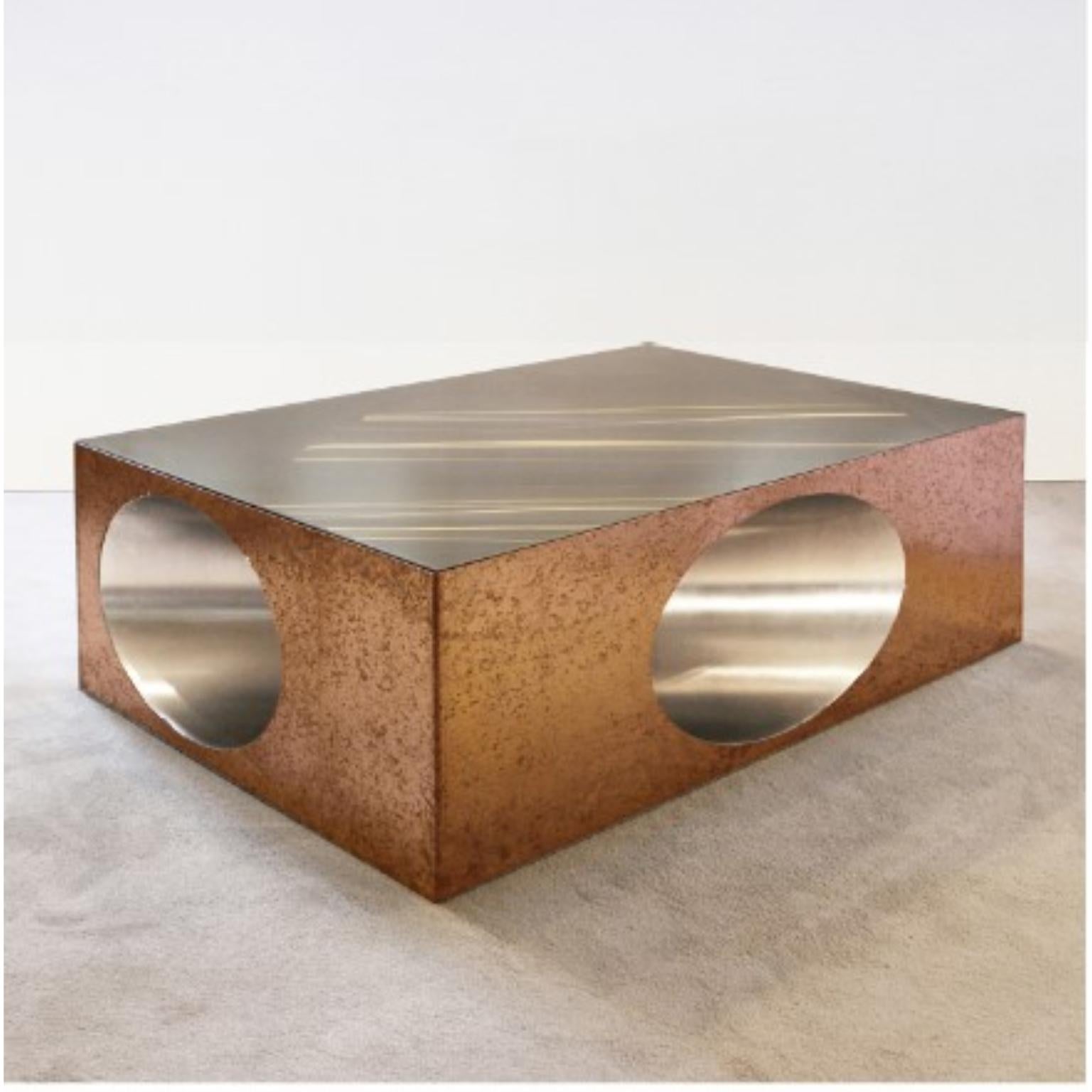 Hol-low table by Christian Zahr
Dimensions: W 120 x D 80 x H 40 cm
Materials: Copper- copper tin lined inside- tainted glass

Each Piece is Handmade.

Christian Zahr studied architecture at the Academie Libanaise des Beaux Arts, Beirut,