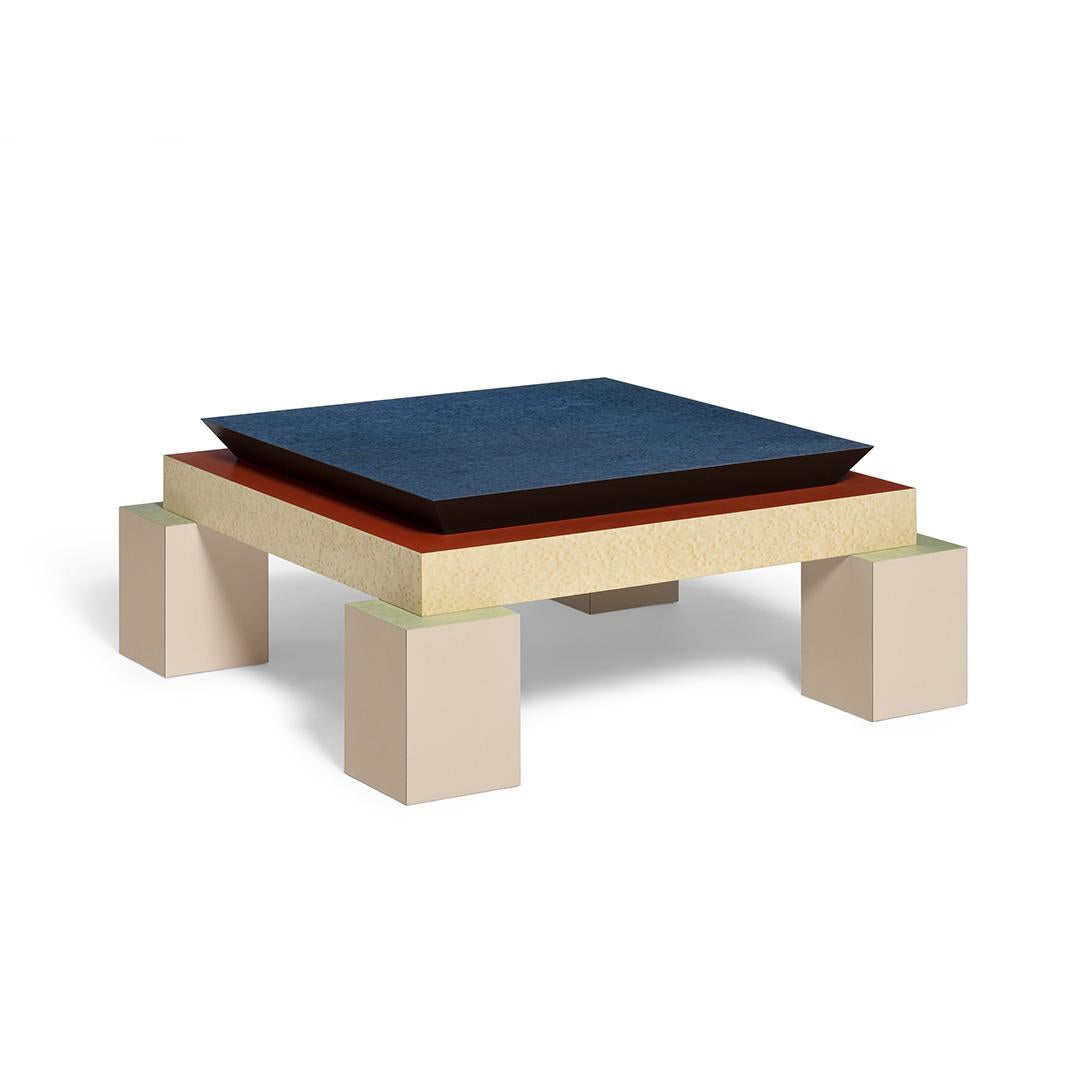 Holebid coffee table in briar and plastic laminate, is designed in 1984 by Ettore Sottsass.

Ettore Sottsass was born in Innsbruck in 1917. In 1939 he graduated in architecture at the Politecnico di Torino. One of the most influential and important