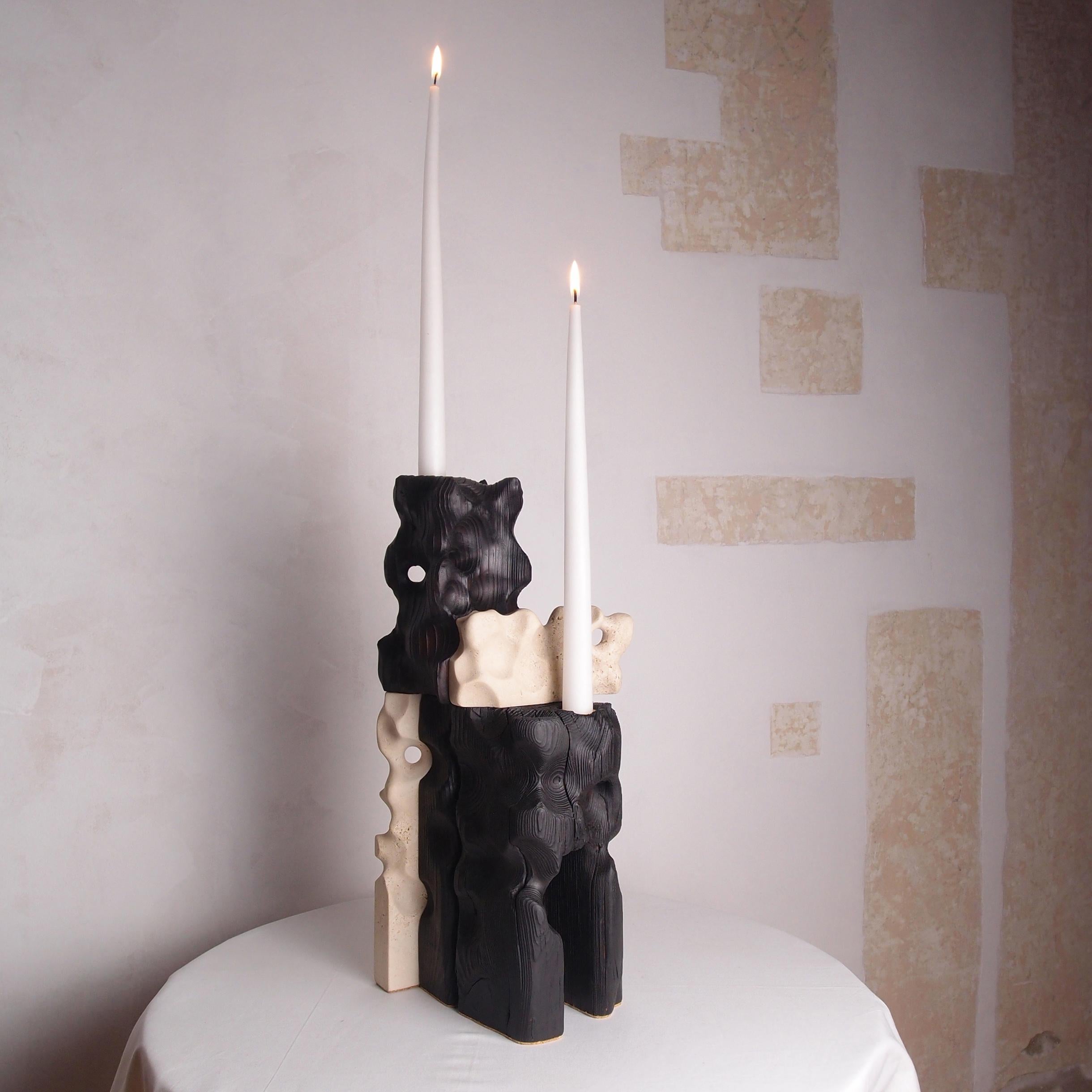 Holey Tower Candleholder by Gabor Gobi
Unique Piece.
Dimensions: D 11 x W 18 x H 41 cm.
Materials: Pine wood and limestone.

This artfully sculpted candle holder is a testament to innovative reuse, handcrafted from repurposed beam wood and remnants