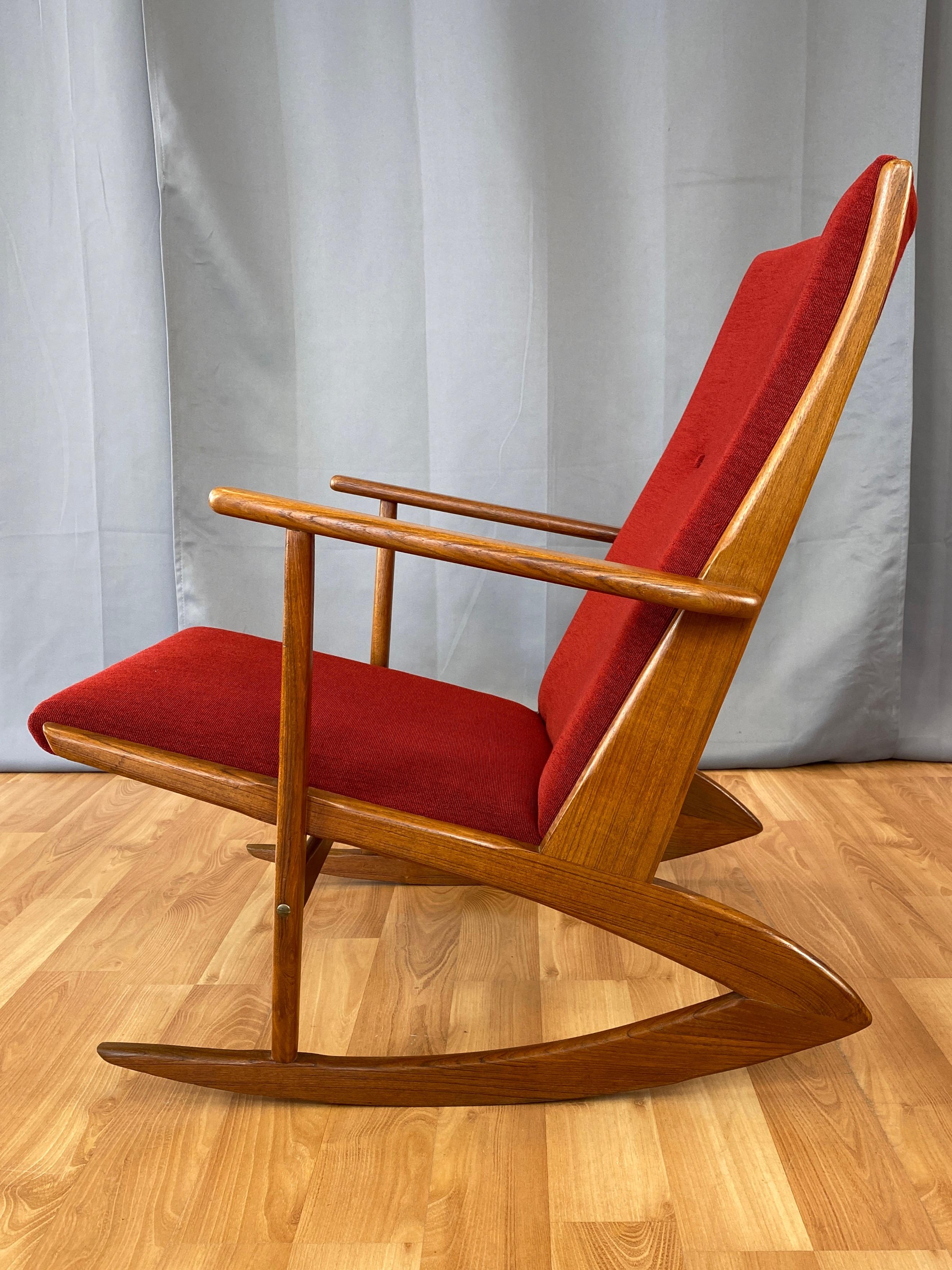 A fantastic Danish modern Model 97 teak rocking chair designed in 1958 by Holger Georg Jensen for Tønder Møbelværk, freshly dressed in vintage red upholstery. Piece pre-dates Jensen’s work done for Kubus in the early-to-mid-1960s.

Gorgeous