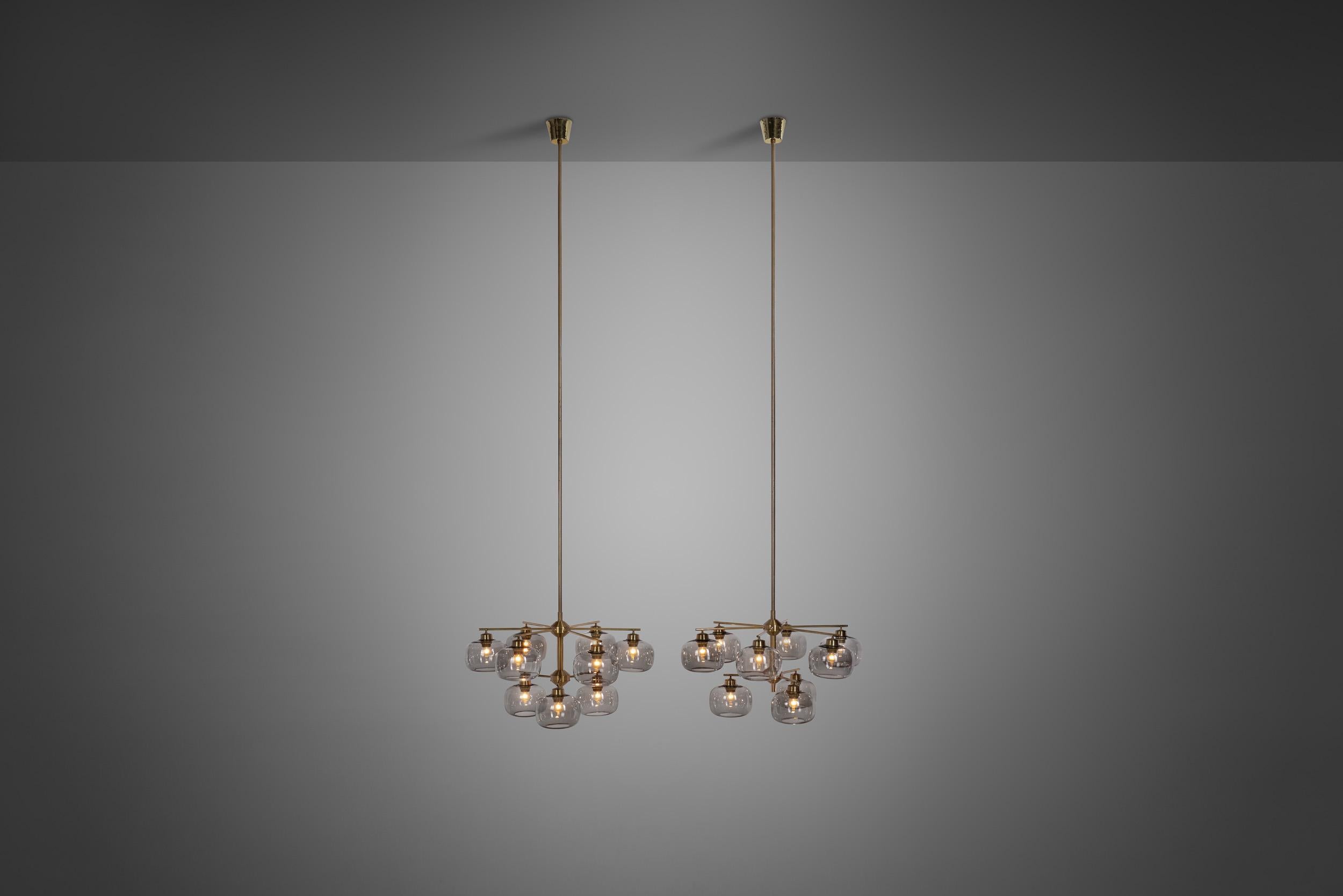 Swedish master of lighting design, Holger Johansson brought much glamour into the Swedish mid-century modernism. Without giving up the “form follows function” ideal of the era, he created spectacular models like these ceiling lights with a grandiose