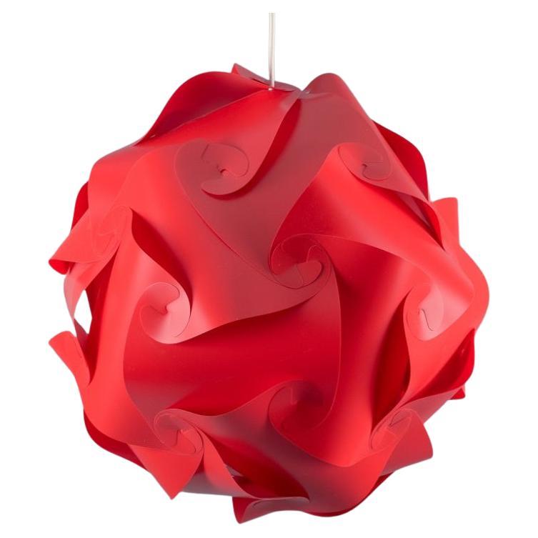 Holger Strøm, IQlight Pendelleuchte. Deckenleuchte aus rotem Kunststoff.  1970s