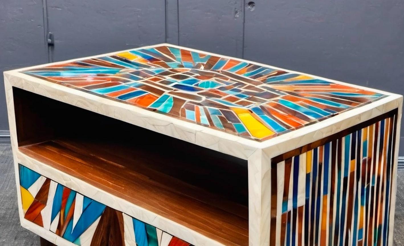 Transport yourself to the vibrant colors and festive spirit of India's iconic festival, Holi, with our exquisite bone inlay side table. This stunning piece represents the culmination of ancient craftsmanship and cutting-edge technology, making it a