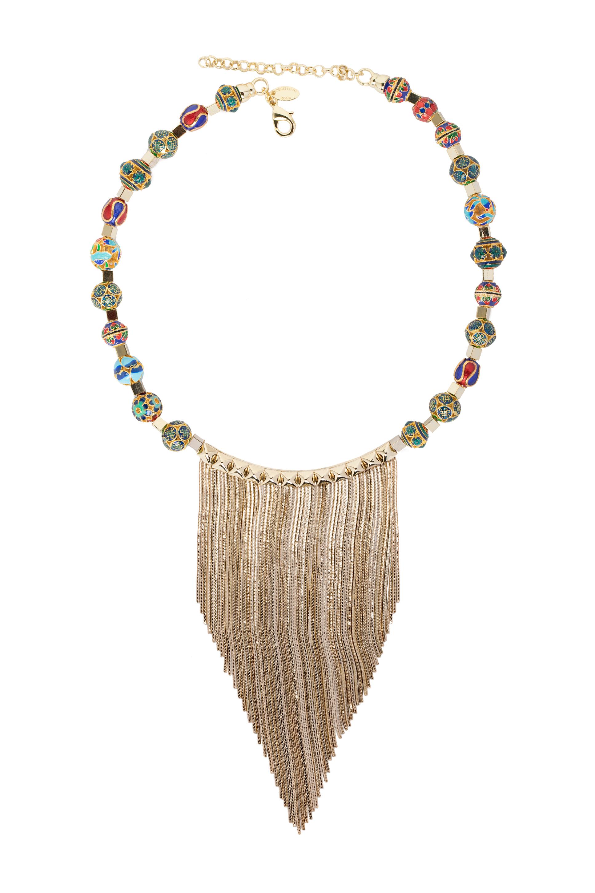 Refined and essential, the statement necklace from IOSSELLIANI is designed to blend some sense of tribal forms into a harmonious balance between elegance and extra impact. The custom made necklace is dotted with small enamel cloisonnèe beads
