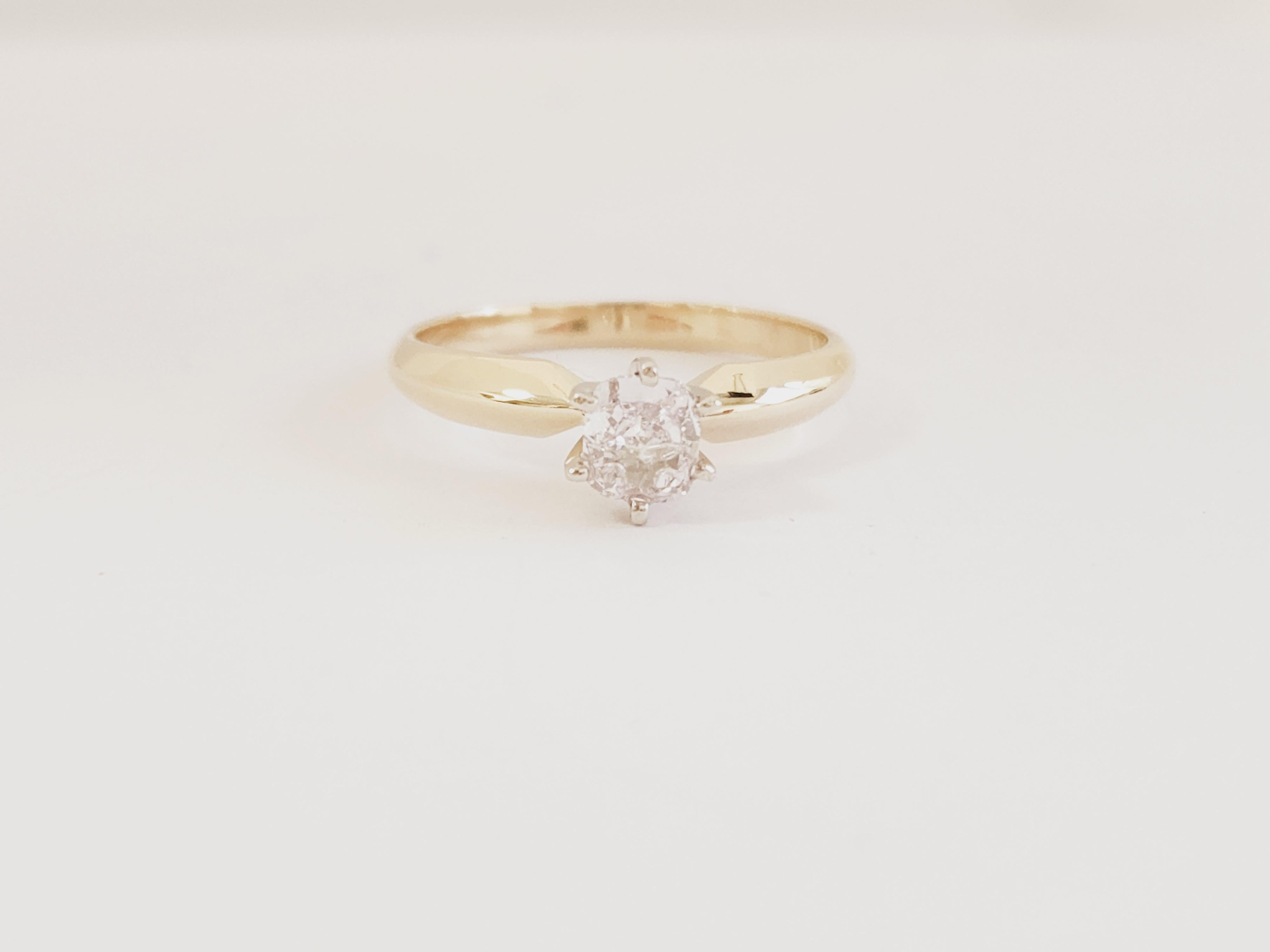 Gorgeous diamond ring features a 0.53 carat GIA faint pink cushion diamond solitaire set in a beautiful 14 karat yellow gold. 


*Free shippng within the US