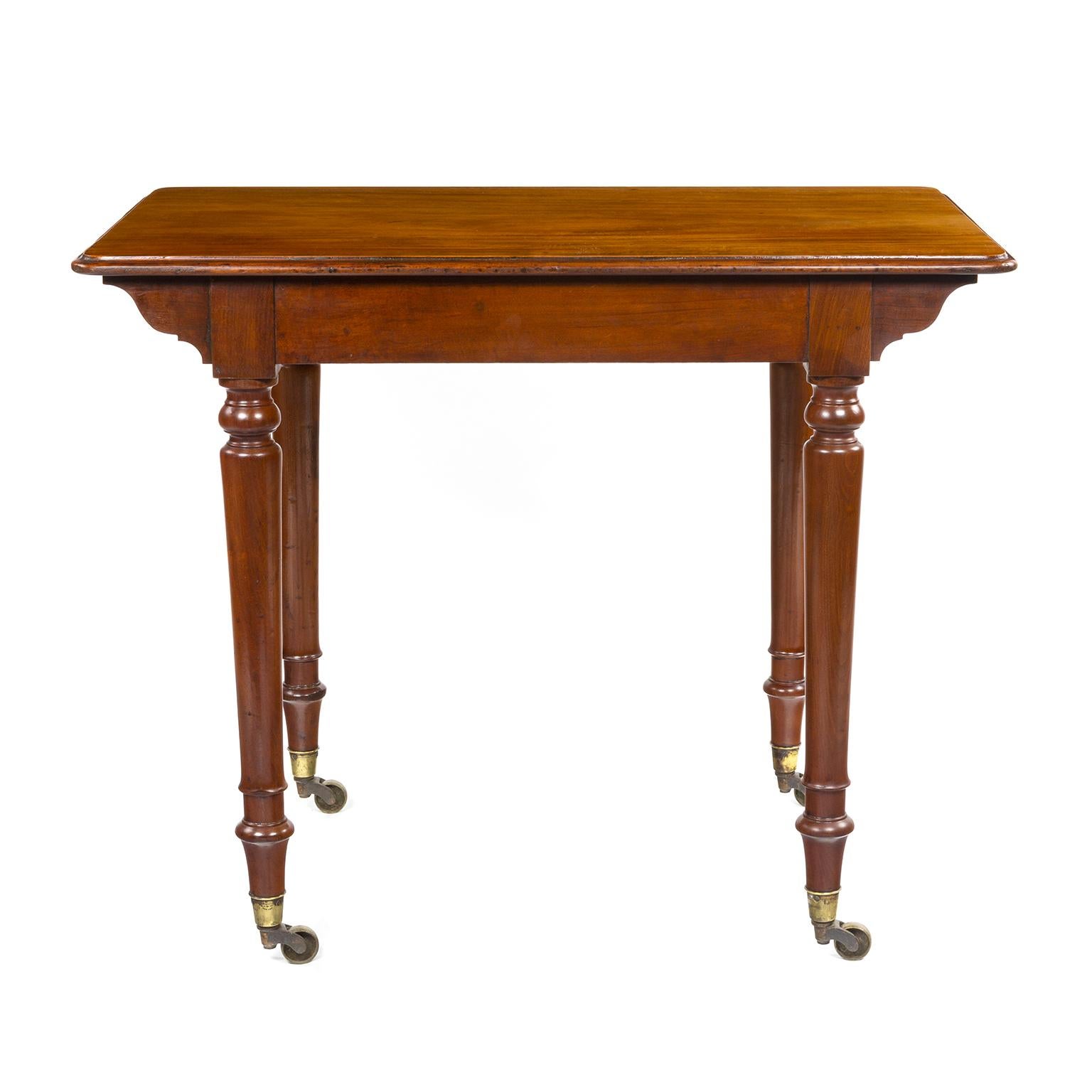 A Regency mahogany side or writing table by Holland & Son, a single draw with original wooden knobs.

The firm of Holland & Sons (1803–1942) became from 1843 one of the largest and most successful cabinet makers, and a rival to Gillows of