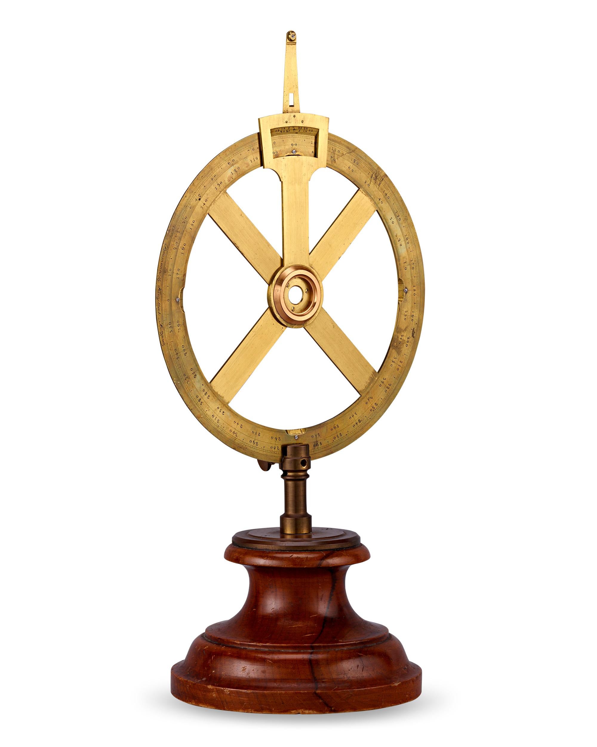 This intriguing item is almost certainly a Holland Circle by German scientific instrument makers Baumann & Kinzelbach. The Holland Circle, sometimes referred to as a Dutch Circle, was used in land surveying and is a precursor to the theodolite, an