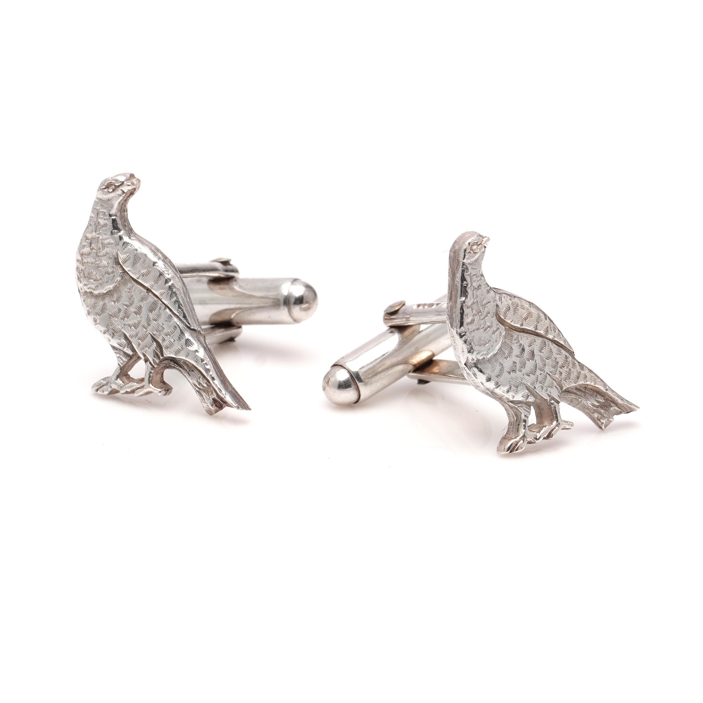 Holland & Holland sterling silver pair of pheasant cufflinks.
Made in England, London, 2009
Fully hallmarked.

Introducing the perfect accessory for the sporting gentleman. These exquisite sterling silver cufflinks are in the shape of two pheasants