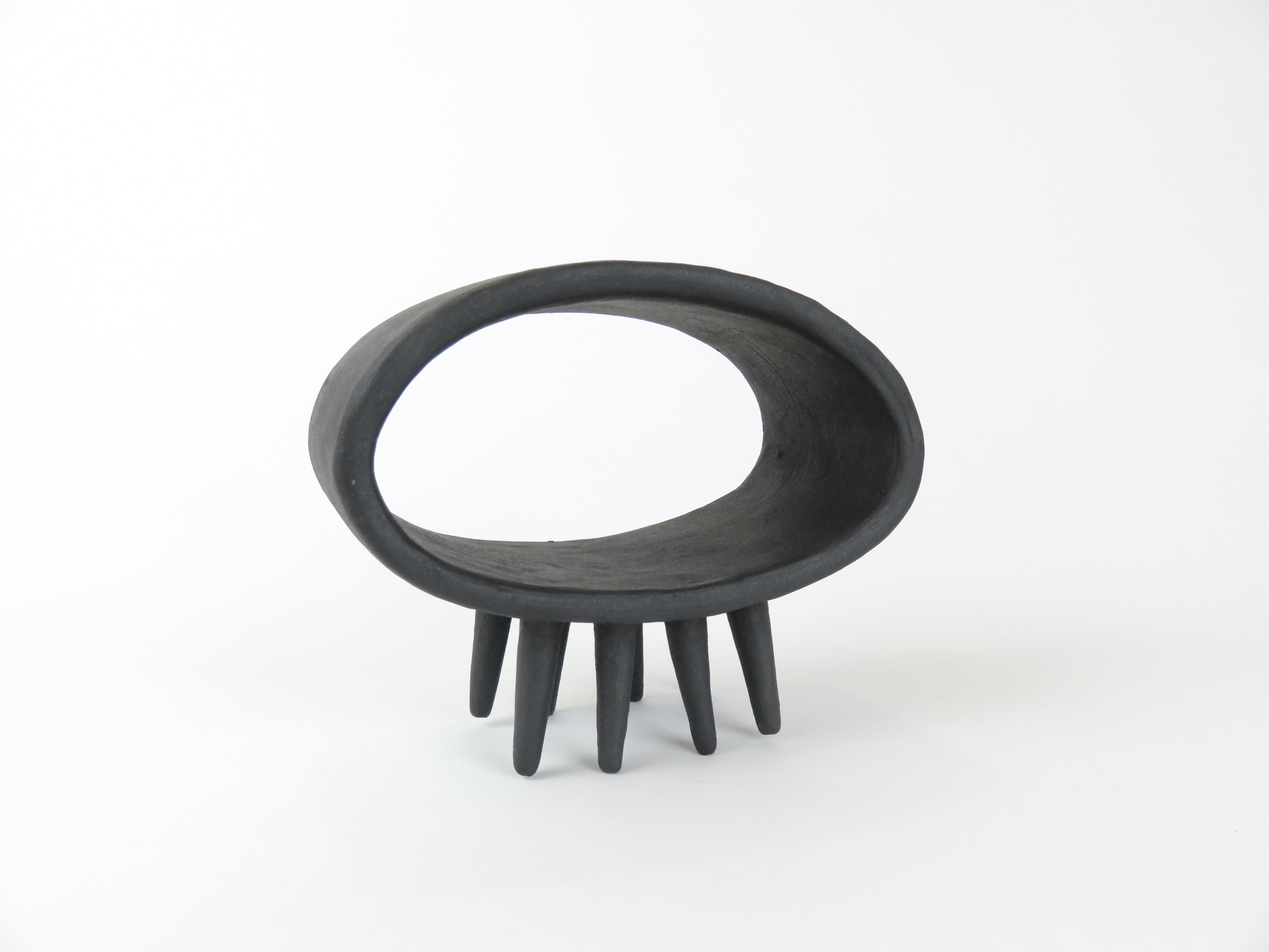 Hollow Black Oval Ceramic Sculpture on Eight Pointed Feet In New Condition For Sale In New York, NY