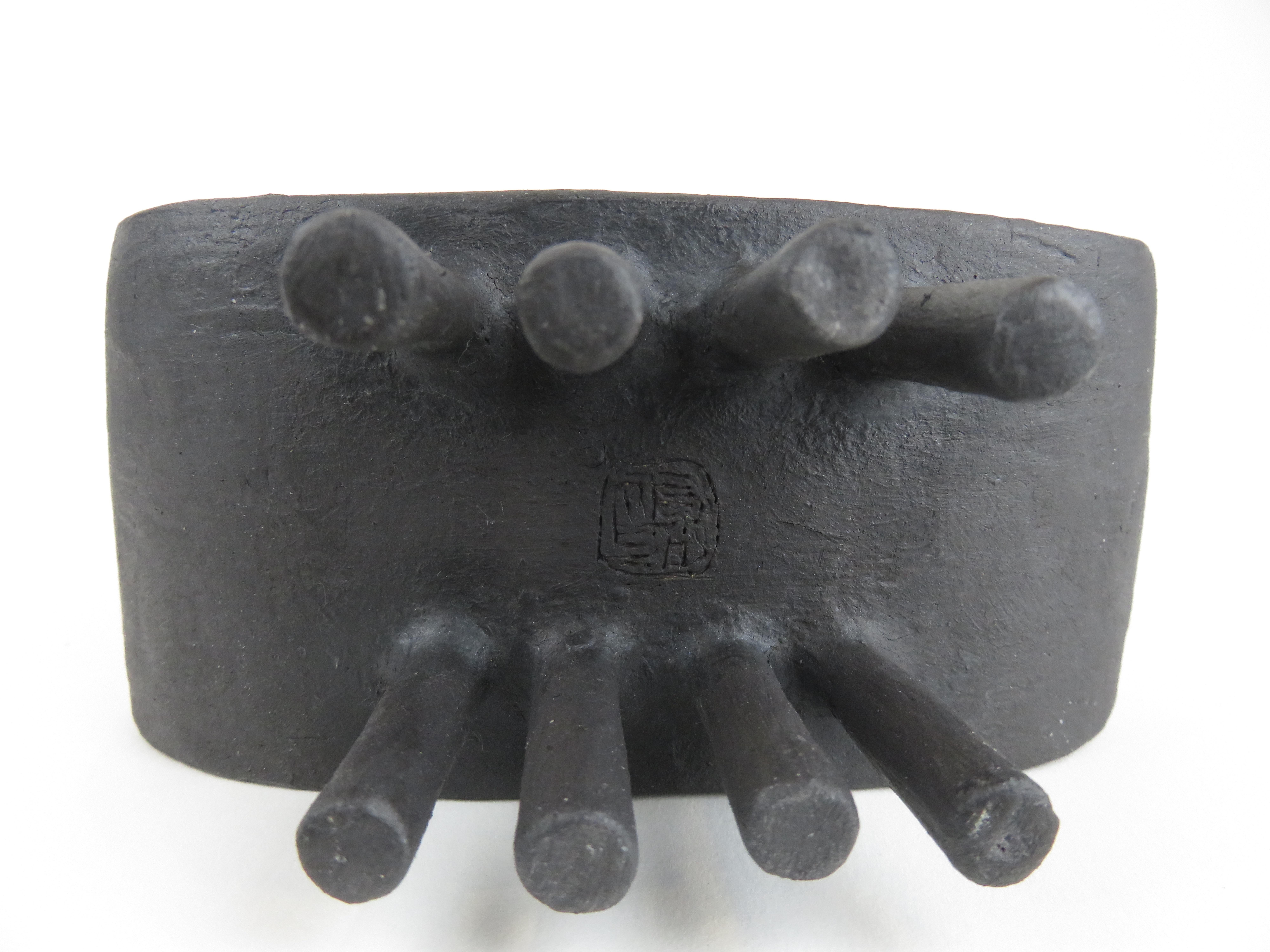 Hollow Black Rectangular Ceramic Sculpture on Eight Slender Feet For Sale 7