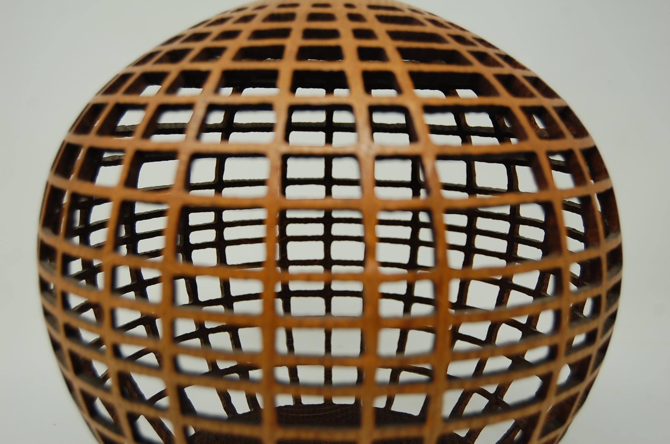 Hollow form vase by Ron Pessolano, in red oak, circa 2004.
