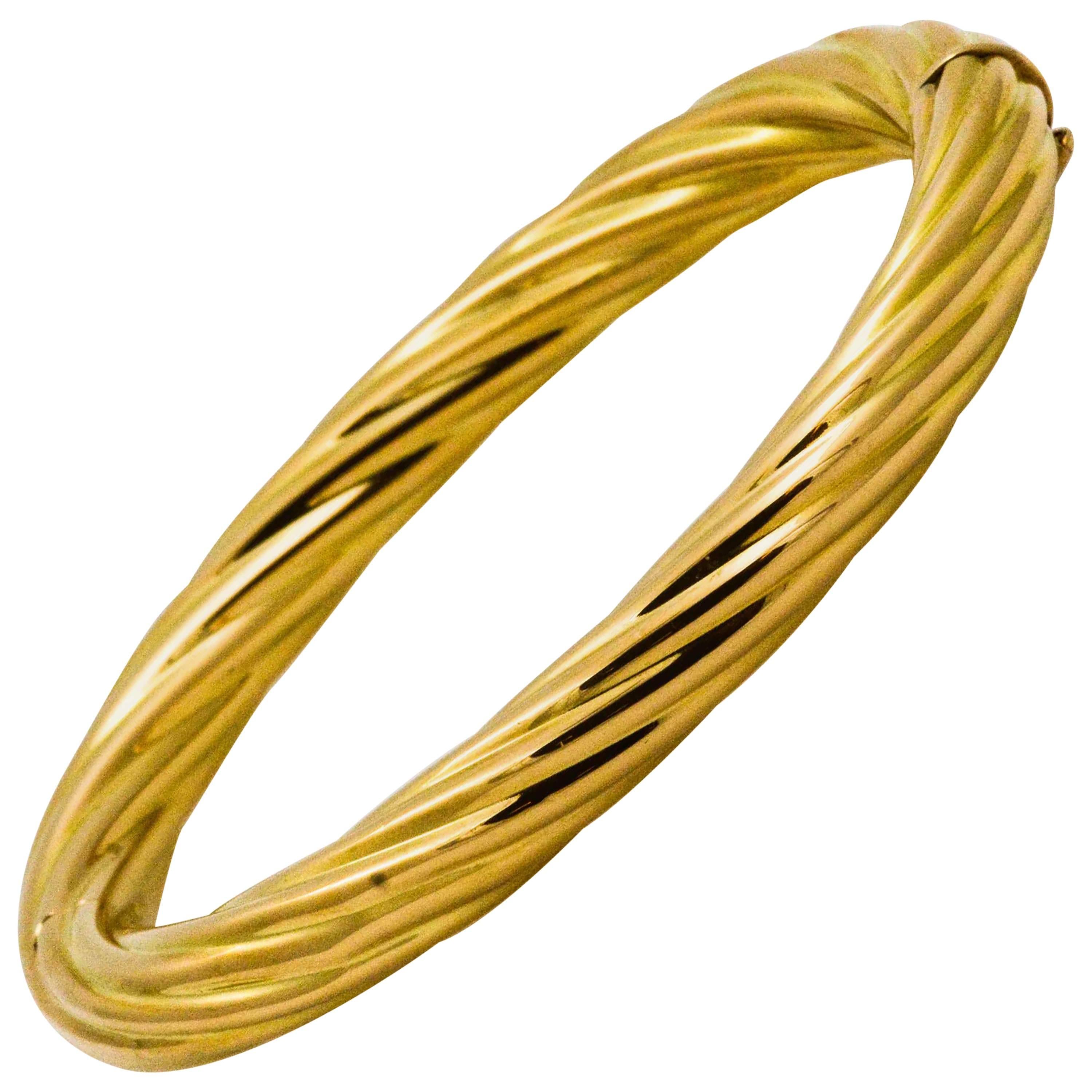 Hollow Twist 18 Karat Yellow Gold Bangle Bracelet