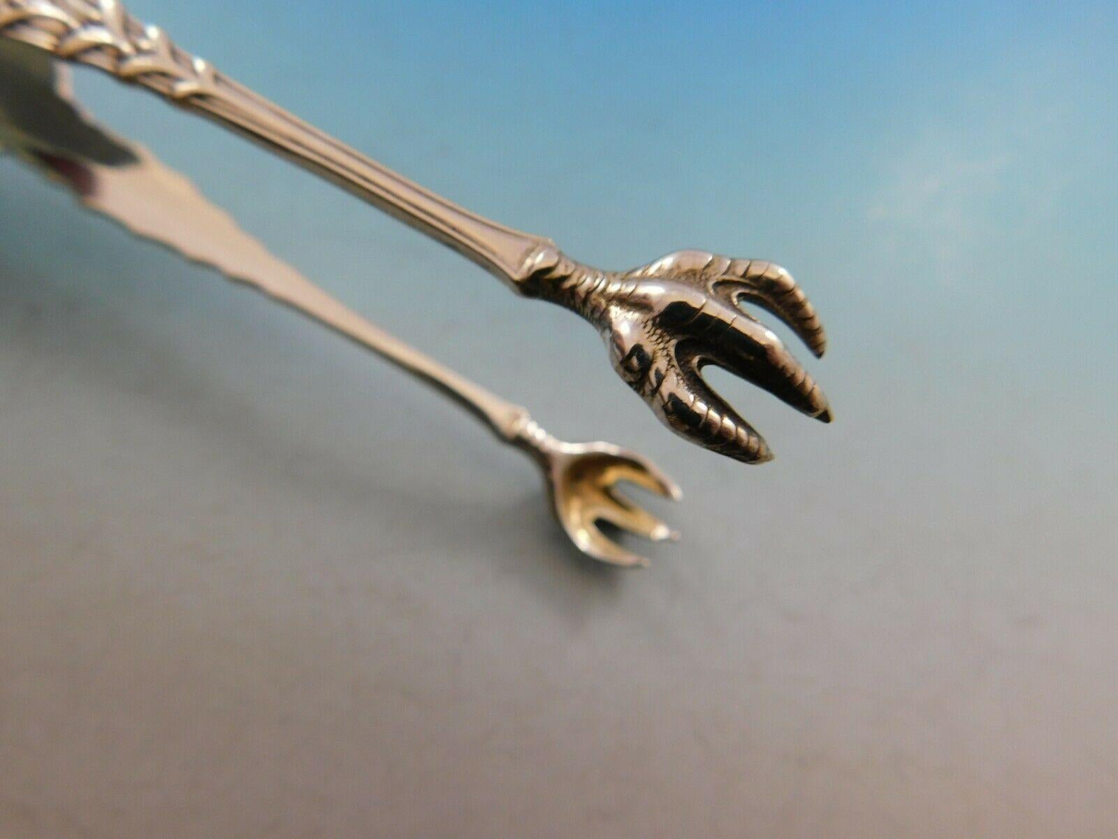 Magnifique pince à sucre en argent sterling mesurant 4 1/4