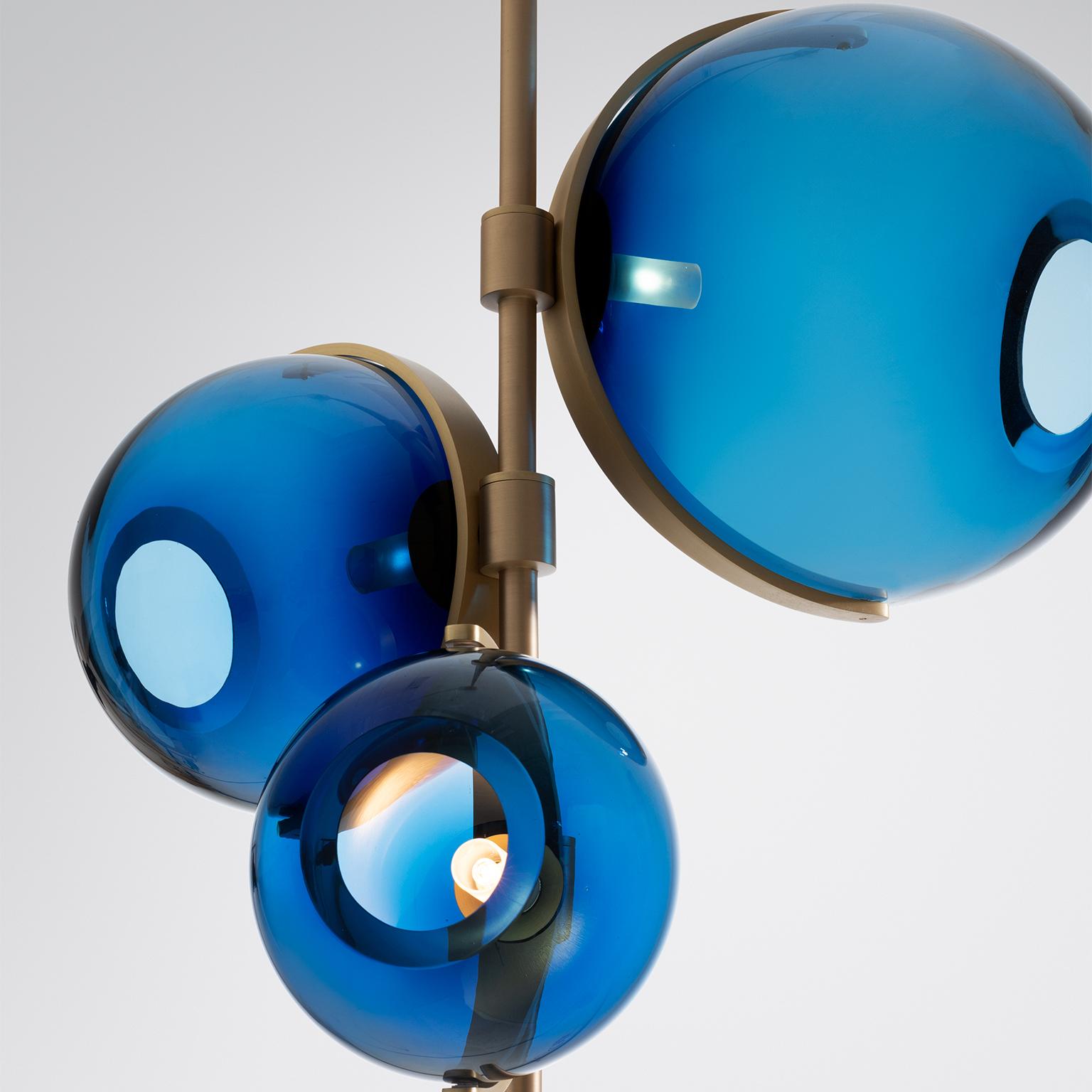 Holly Hunt Another day chandelier with brass & glass by Damien Langlois-Meurinne

Additional Information:
Materials: Brass, glass
Frame finish: Brushed brass satin varnish
Glass finish: Steel blue glass
Diffuser: Glass
Illumination: Socket