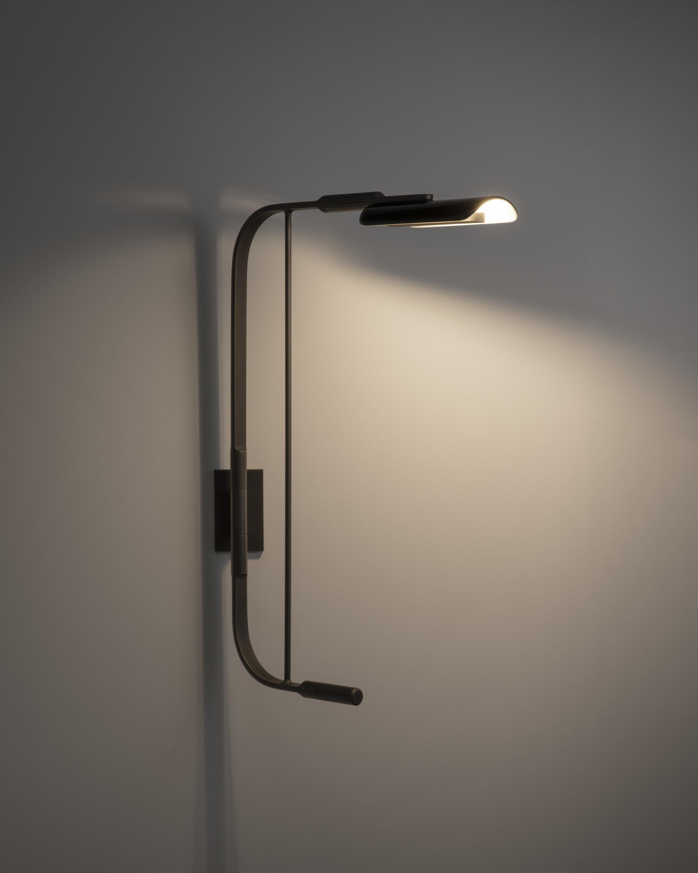 Contemporary HOLLY HUNT Bowyer LED Sconce in Dark Bronze Patina with Black Glass Shade