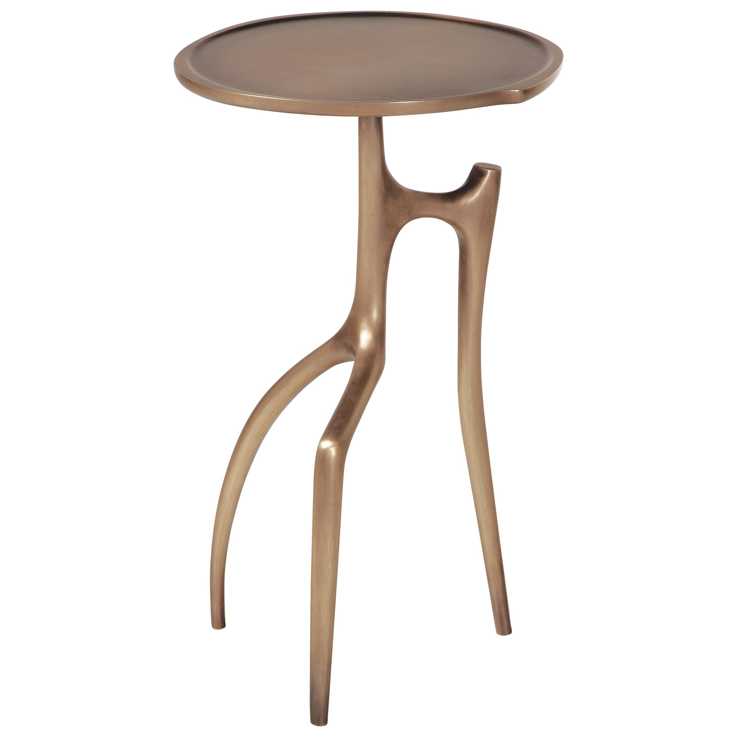 The Holly Hunt patinated-bronze Branche side table, named for its arboreal legs