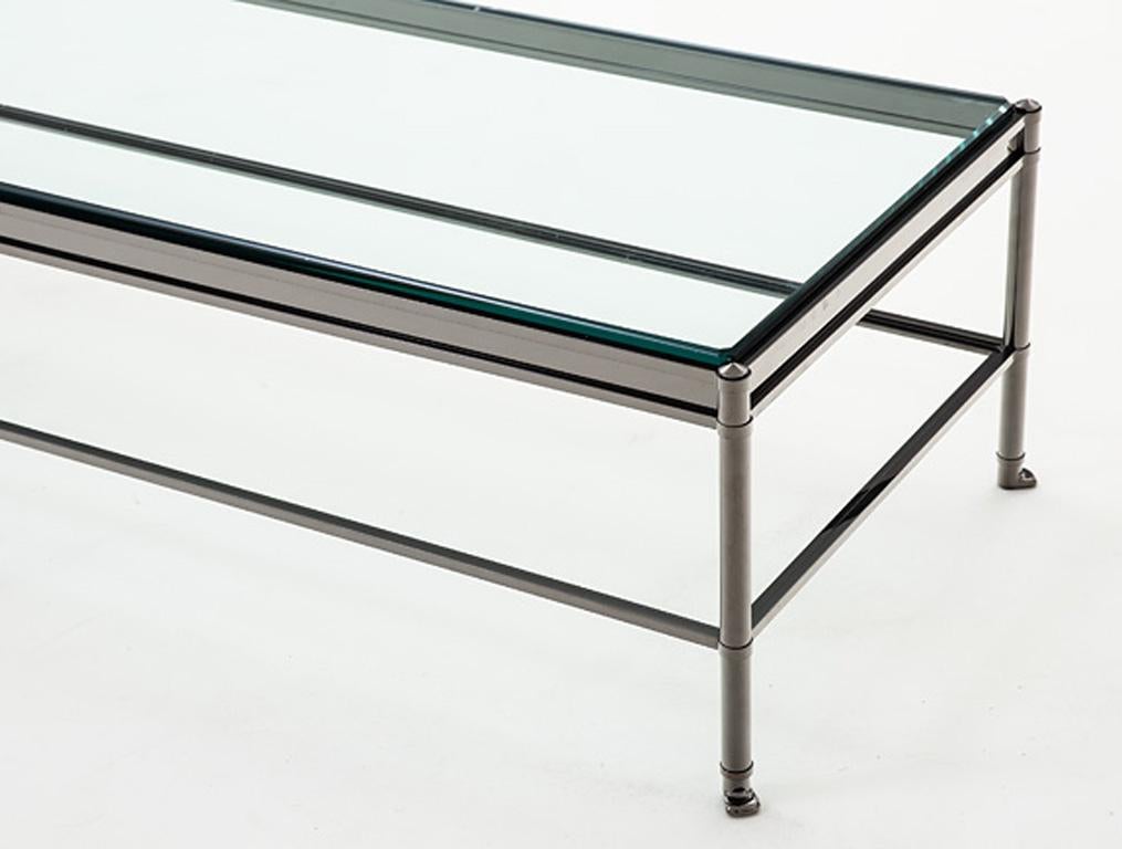 Holly Hunt D'orsay single-tier frame cocktail large table in nickel & glass top

Additional Information:
Materials: Nickel, beveled glass
Base finish: Polished black nickel 
Top: Clear beveled glass (3/4 inch)
Dimensions: 66 W x 27 D x 18 H
