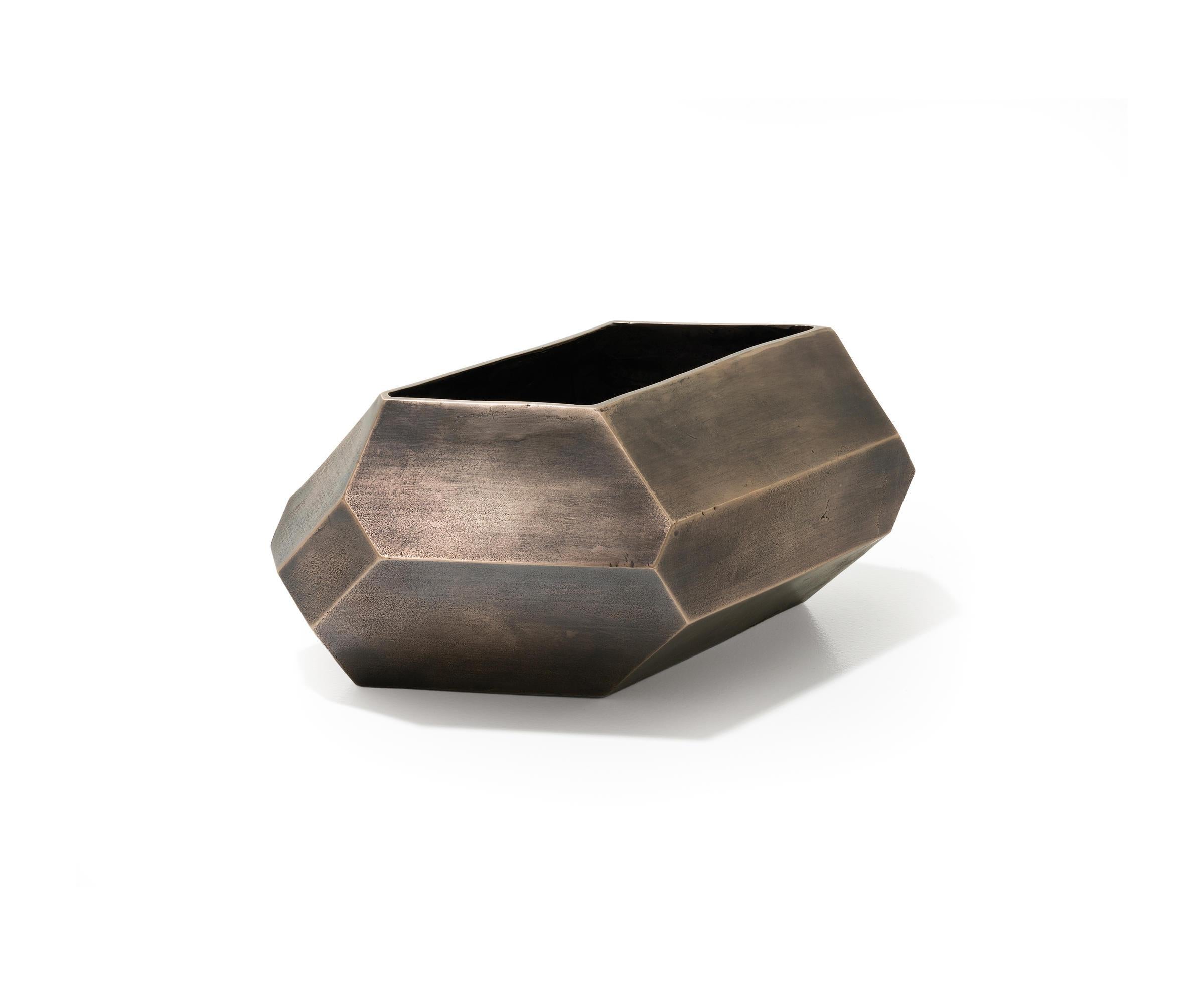 Holly Hunt Faceted block horizontal vase in bronze by Stefan Gulassa

Faceted Block Vase Horizontal

Stefan Gulassa was born the youngest of six in a highly creative family that continues to influence his work. After studying Industrial Design