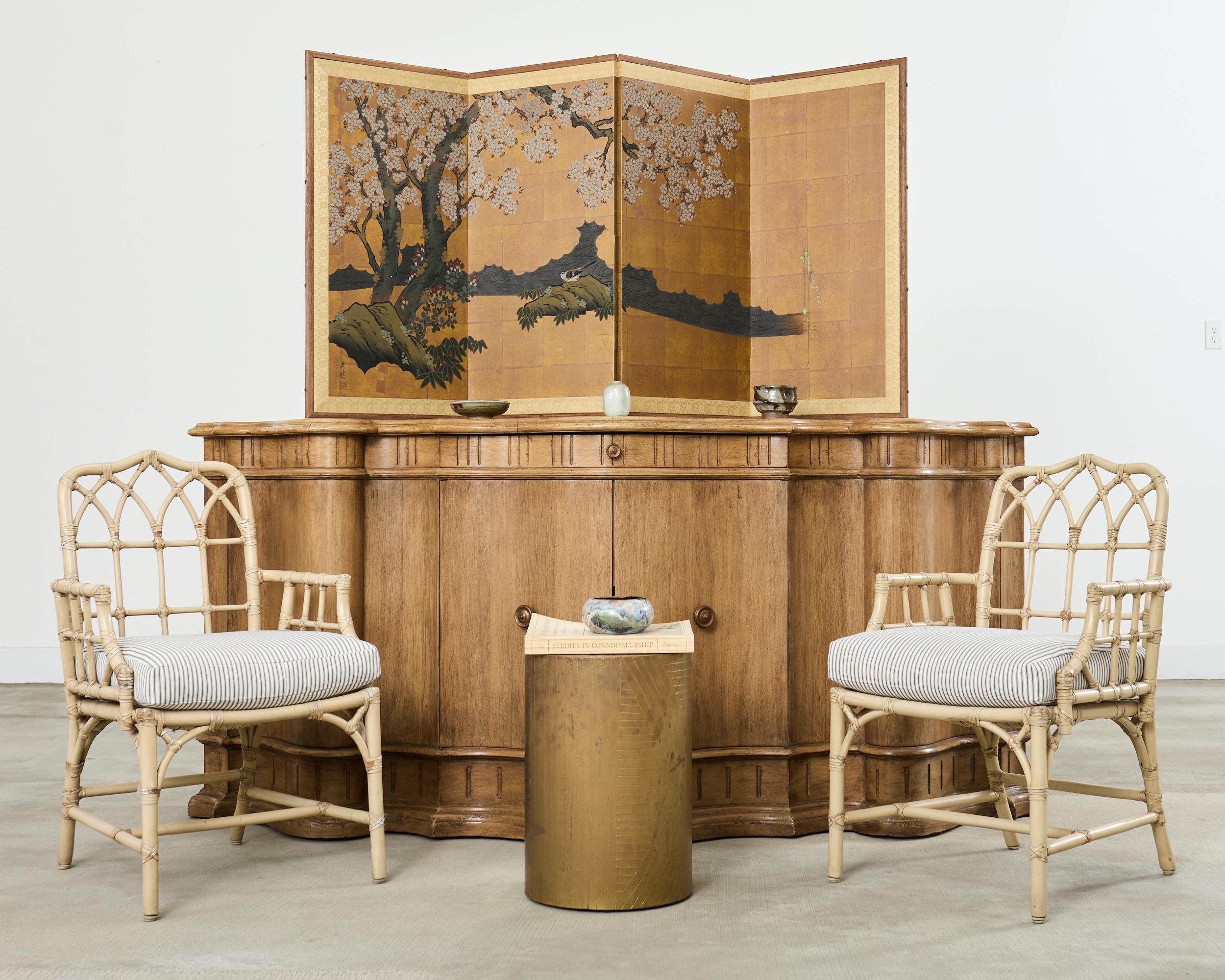 Character rich honey-toned oak sideboard or buffet by Holly Hunt for Therien studio workshop. Features a large serpentine case in a dark patina with a parcel gilt finish and construction from fine oak with rich woodgrains. The base has a gently
