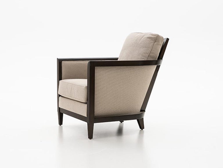 Holly Hunt Hemp Sail club chair with oak umber and beige upholstery

Additional Information:
Materials: Oak, upholstery
Frame finish: Oak umber 
COM: Sweet dreams/Sand dune
Dimensions: 27.5 W x 35 D x 33 H inch
Available in other frame finish