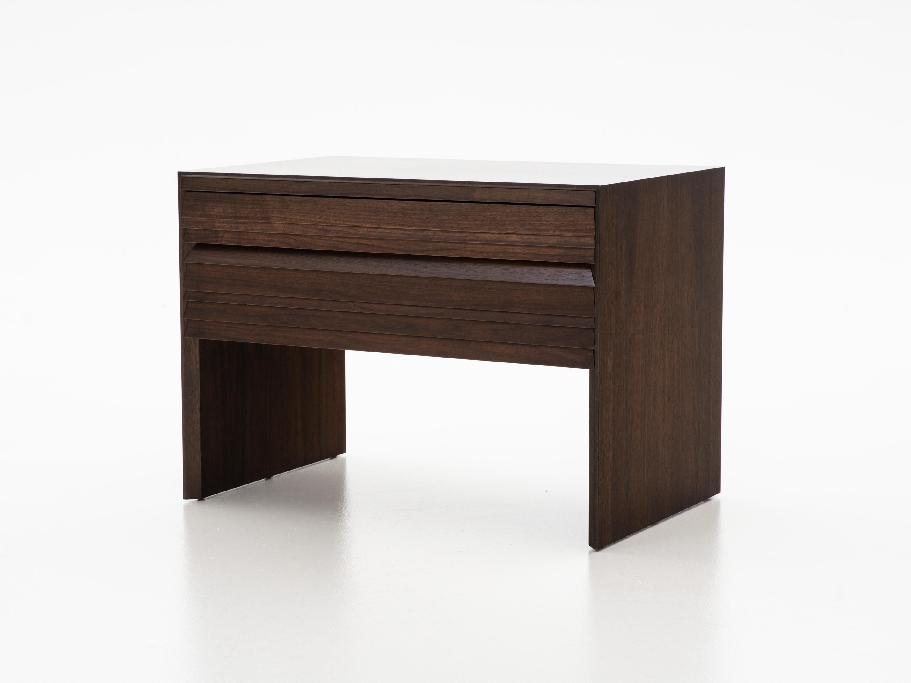 HOLLY HUNT Louvered bedside table in dark walnut finish. A highly functional solution for bedside that is perfectly proportioned with space for your favorite book and more.

Additional Information:
Finish: Walnut Dark Cocoa: 07-150
Condition: New