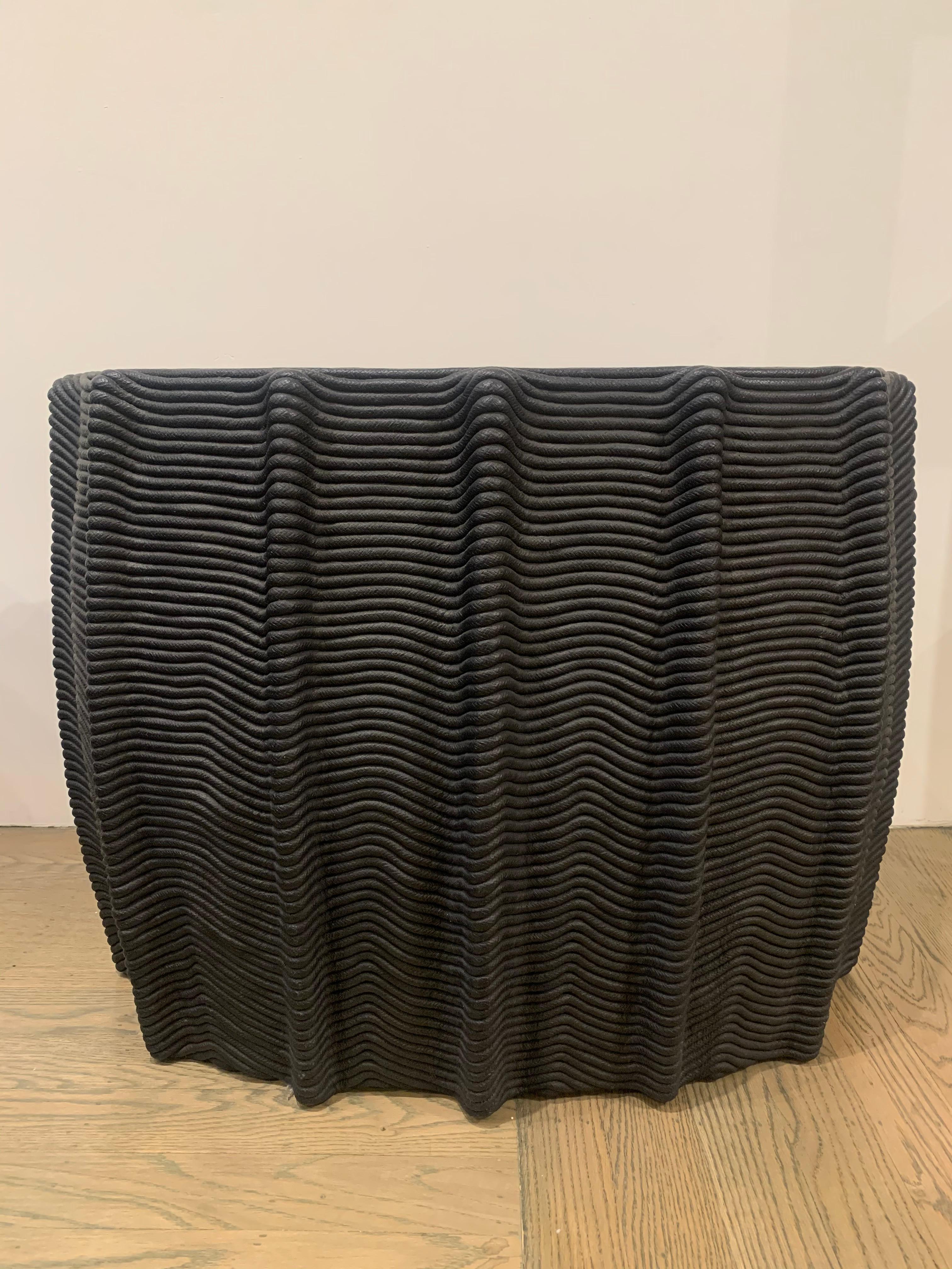 HOLLY HUNT Mivale HH024302 side table in black cotton cord by Christian Astuguevieille

Additional Information:
Materials: Black painted cotton cord
Dimensions: 33.5 W x 19.7 D x 25.6 H inch
Available in other finish options: Ceruleum Blue Cotton