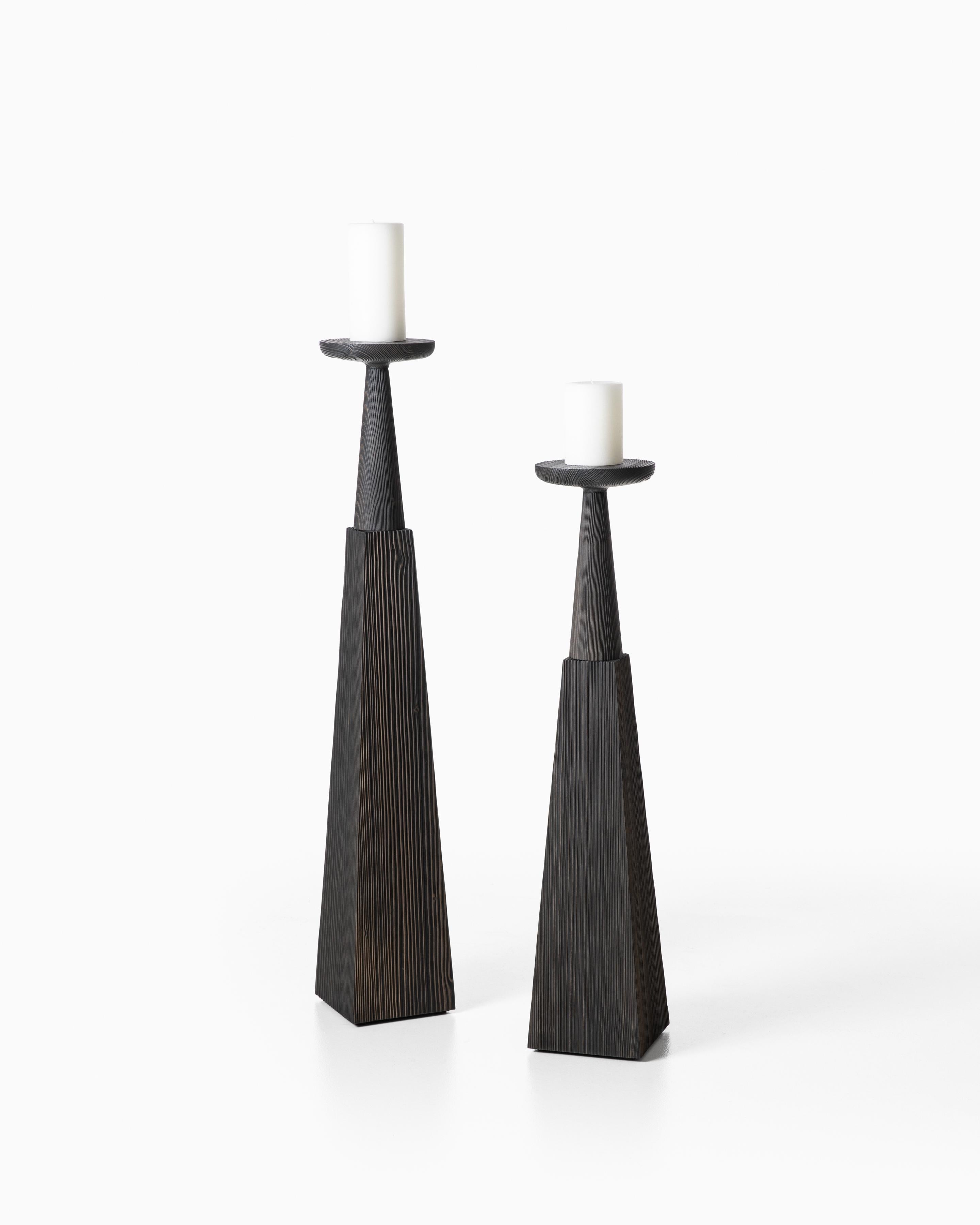 Inspired by candlesticks found in a catherdal and made of solid spruce with metal, these substantial candles provide a reverent yet calming ambiance. Brushed spruce, black tinted.

Additional Information:
Material: Brushed spruce, black tinted