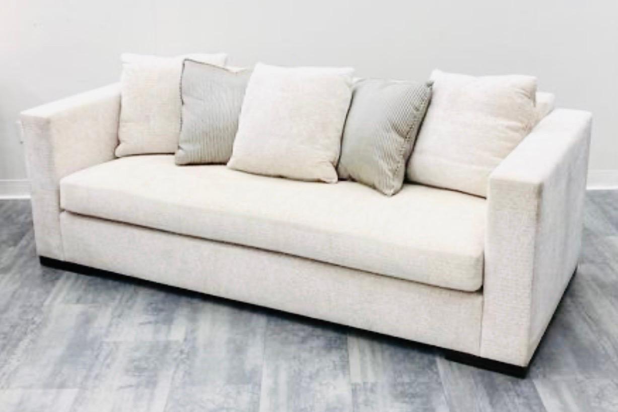 Elegant, sleek and transitional Holly Hunt Studio H modern sofa. The fabric color is hard to describe - a cross between oyster and gray-beige; see pics. The sofa is very comfortable and is on the firmer side. Minor age appropriate wear.