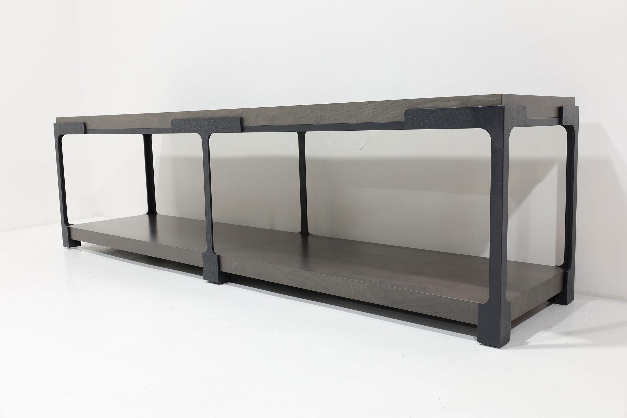 Elegant console by Holly Hunt. Highest quality. This one is a custom design in hand forged iron with a stained ash top. Standard size is 78
