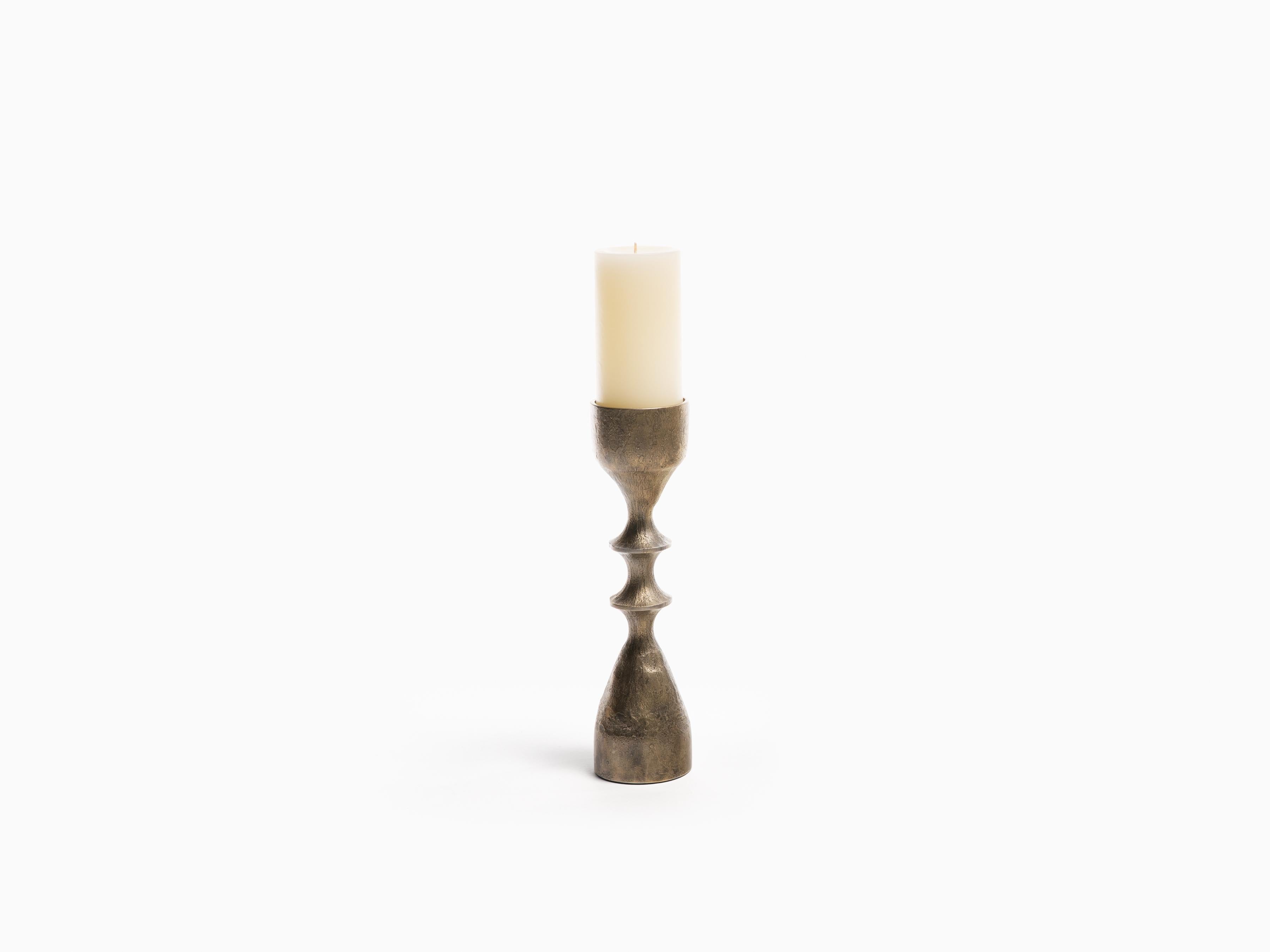 Whether they’re accessorized with candles or left nude as sculpture, the Vinca Candlesticks make a handsome addition to a bookcase, console, or end table. Arrange them in groups, or let their totemic forms stand on their own. > 2.75
