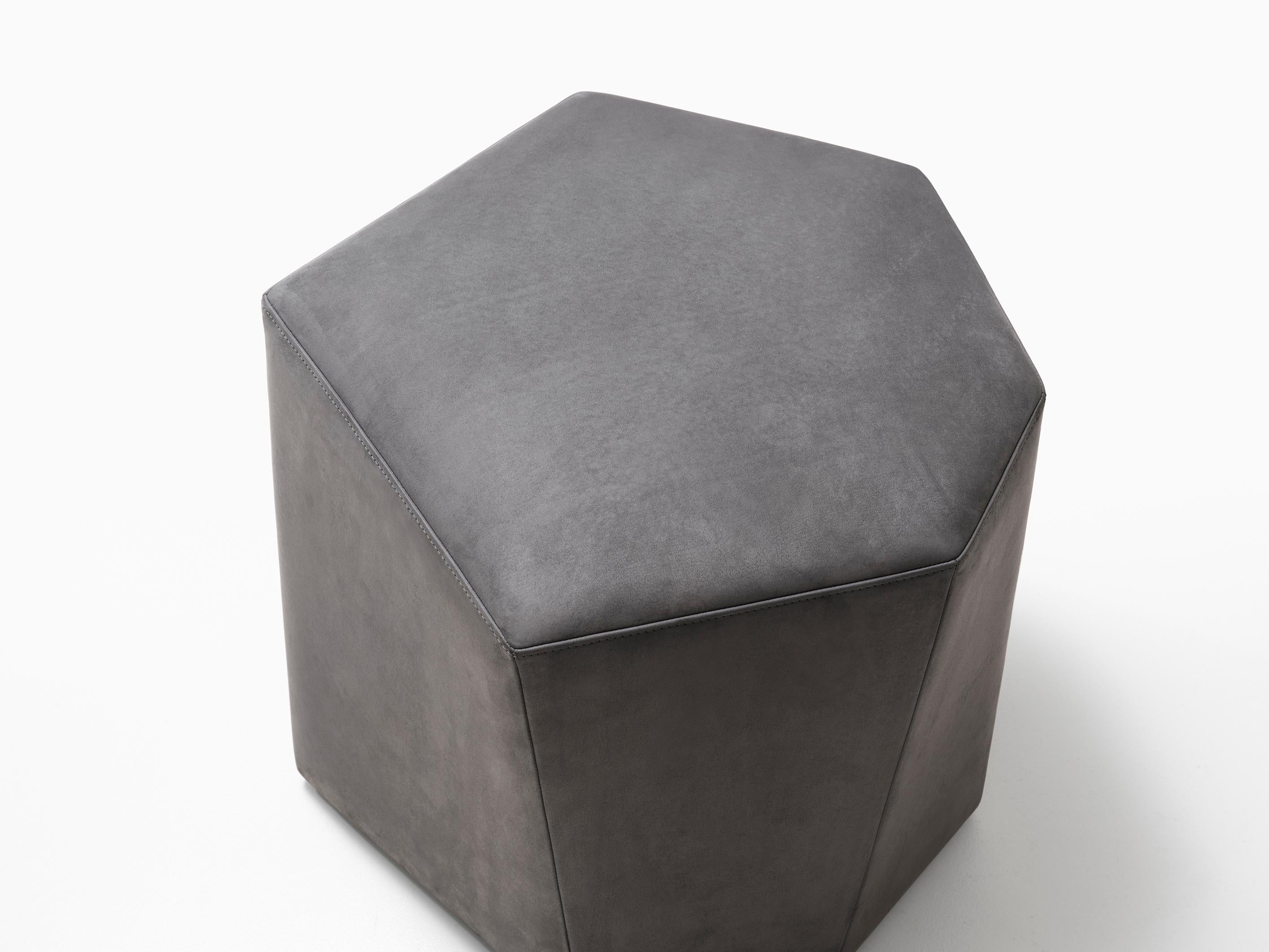HOLLY HUNT Vrille ottoman in elephant leather. A wonderful geometric ottoman highlighting precise stitching details that will add interest, or additional seating, to any living space.


Additional Information:
Leather: 6002/22 Made in the Suede: