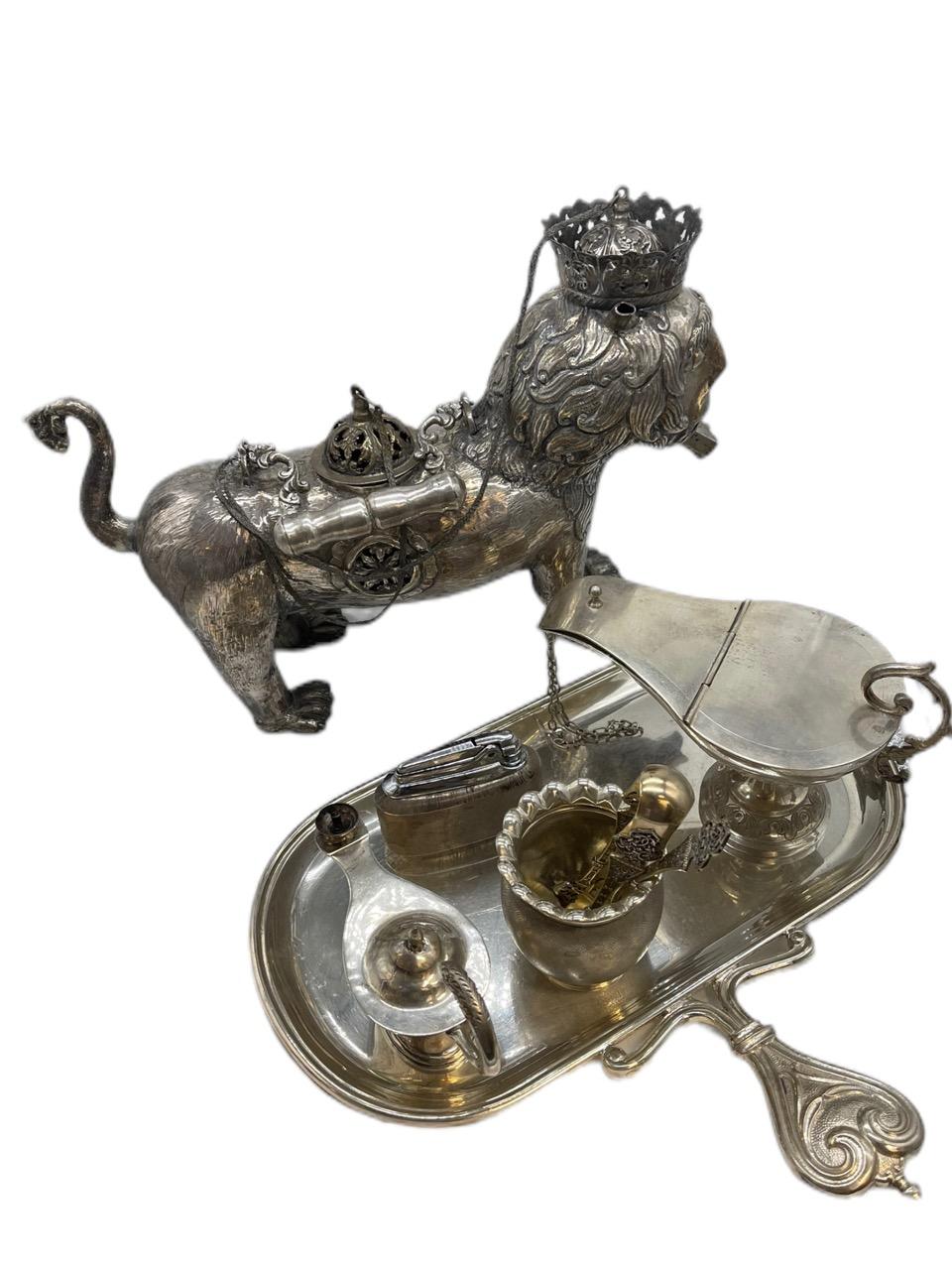 Early 19th Century (1830) Crowned Lion of Judah shaped censer made of 800-silver by Candido Silva in Buenos Aires for the Bishop Mariano Medrano y Cabrera. 9.5H x 14W x 4D (inch)

Early 19th Century Spanish Colonial Silver oil lamp with lion motif