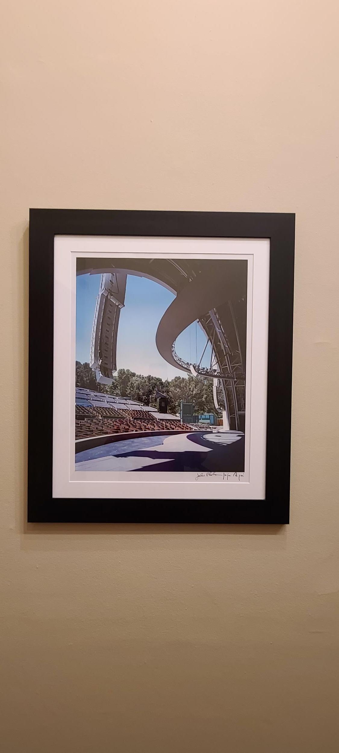 Original untitled color chromogenic photographic print of the Hollywood Bowl under renovations by photographer Julius Shulman, signed. Framed in a black wood frame. 

This was a small limited edition and photographed for a fundraiser for the