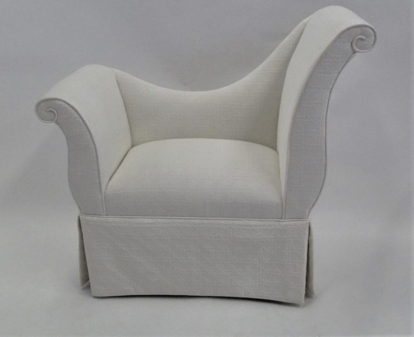 Hollywood Regency glamour for the boudoir or bedroom, off to the side or at the vanity, this delightful chair or bench has curling arms at differing heights and a dressy skirt reminiscent of the films of yesteryear. We can imagine Harlow or Garbo