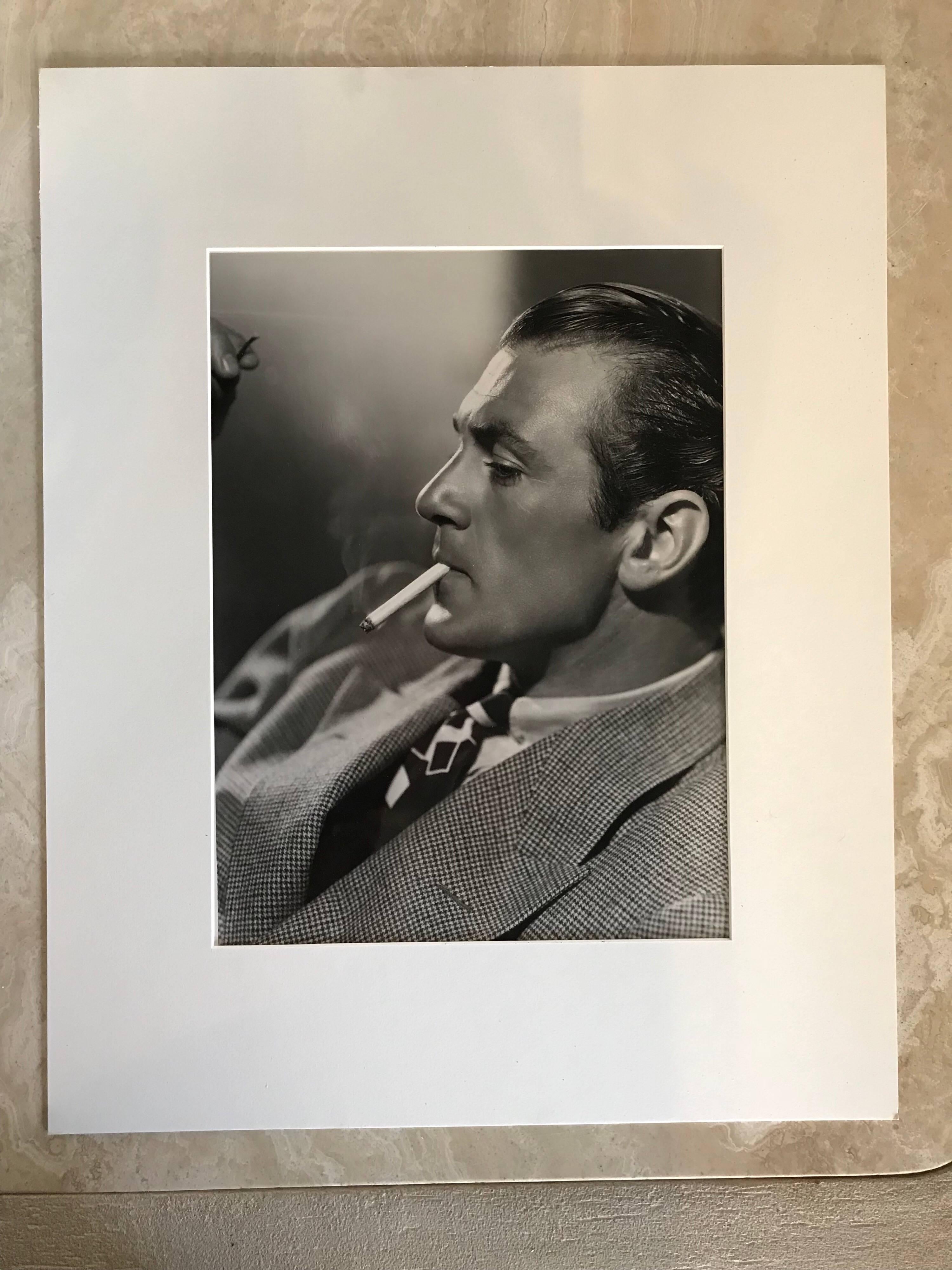 This portrait of the late actor, Gary Cooper was printed decades ago from the original negative. Shot by the legendary photographer, Clarence Sinclair Bull. This was part of a large collection of old Hollywood Glamour photographs all from Hollywood