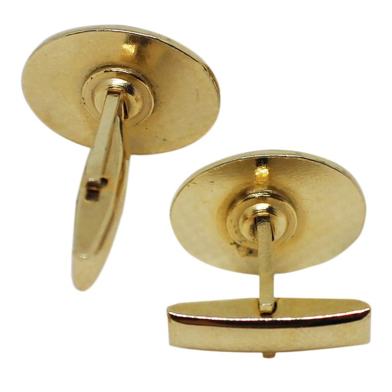 Circa 1980s Gold Tone Cufflinks Owned and worn by Hollywood Icon Jerry Lewis, the cufflinks feature a raised Logo of MDA , Muscular Dystrophy Association for which Mr. Lewis devoted much of his life to raising money for a cure famously through the
